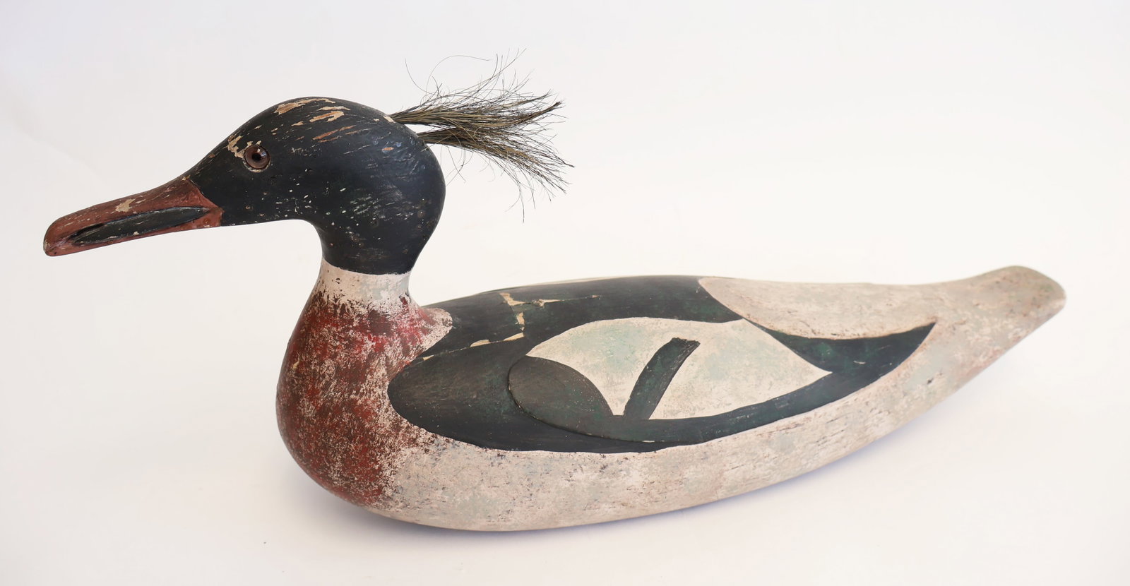 Wooden Merganser Decoy with Tufting: 8" x 19" x 6" wide Gurley Auction Company provides IN HOUSE PACKING AND SHIPPING and we strive to keep costs as reasonable as possible. Please take the time to research the cost of shipping for the it