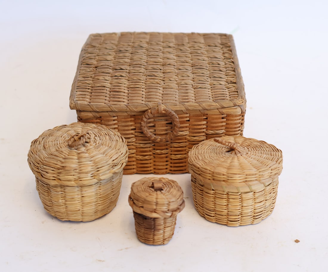Lot of Four Native American Sweet Grass Baskets: Lidded Square Basket: 2" x 4 1/4" x 4 1/2" Round Covered Basket: 1 1/2" x 2 1/8" Gurley Auction Company provides IN HOUSE PACKING AND SHIPPING and we strive to keep costs as reasonable as possible. Pl