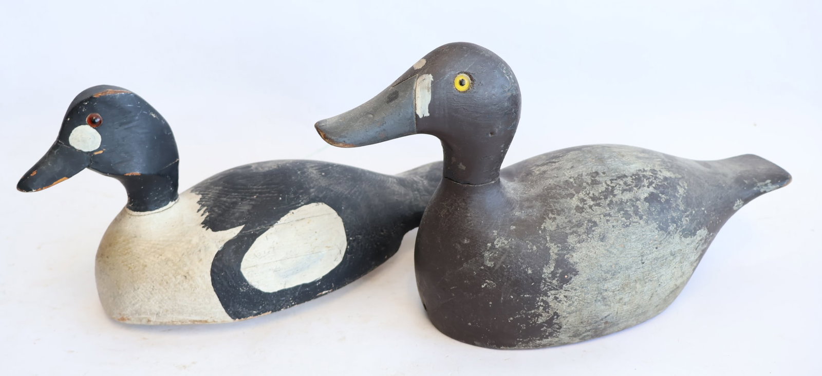 Lot of Two Wooden Duck Decoys with Glass Eyes: 13" x 7" x 5" 8" x 14" x 5" Gurley Auction Company provides IN HOUSE PACKING AND SHIPPING and we strive to keep costs as reasonable as possible. Please take the time to research the cost of shipping f