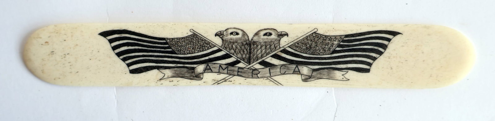 Etched Bookmark with Eagles, Flags, and America- Made of Bone: 6 1/2" x 1" Gurley Auction Company provides IN HOUSE PACKING AND SHIPPING and we strive to keep costs as reasonable as possible. Please take the time to research the cost of shipping for the items tha