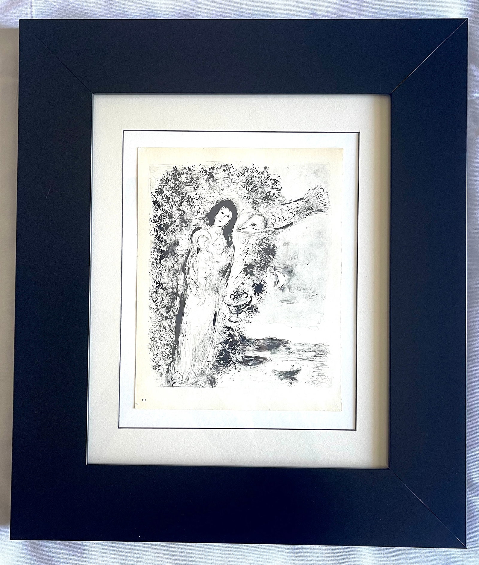 Marc Chagall (1887-1985) Heliogravure en Noir, "Virgin with Fish": NO RESERVE Item Details Artist: Marc Chagall Title: Virgin with Fish Year: cir. 1958 Dimensions: Paper size 28cm x 22 cm Framed: yes Medium: Heliogravure Condition: Good Shipping: In House, $45 withi
