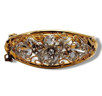 Antique Victorian 18K Gold & Diamond Bracelet: Antique Victorian 18K Gold & Diamond Bracelet Diamonds: 2.75 mm Center Diamond Surrounded by 1.75 mm Diamonds. Total 45 Diamonds, Totaling 1.01 Carats. Bracelet Diameter: 5.6 Centimeters Approx. 19cm