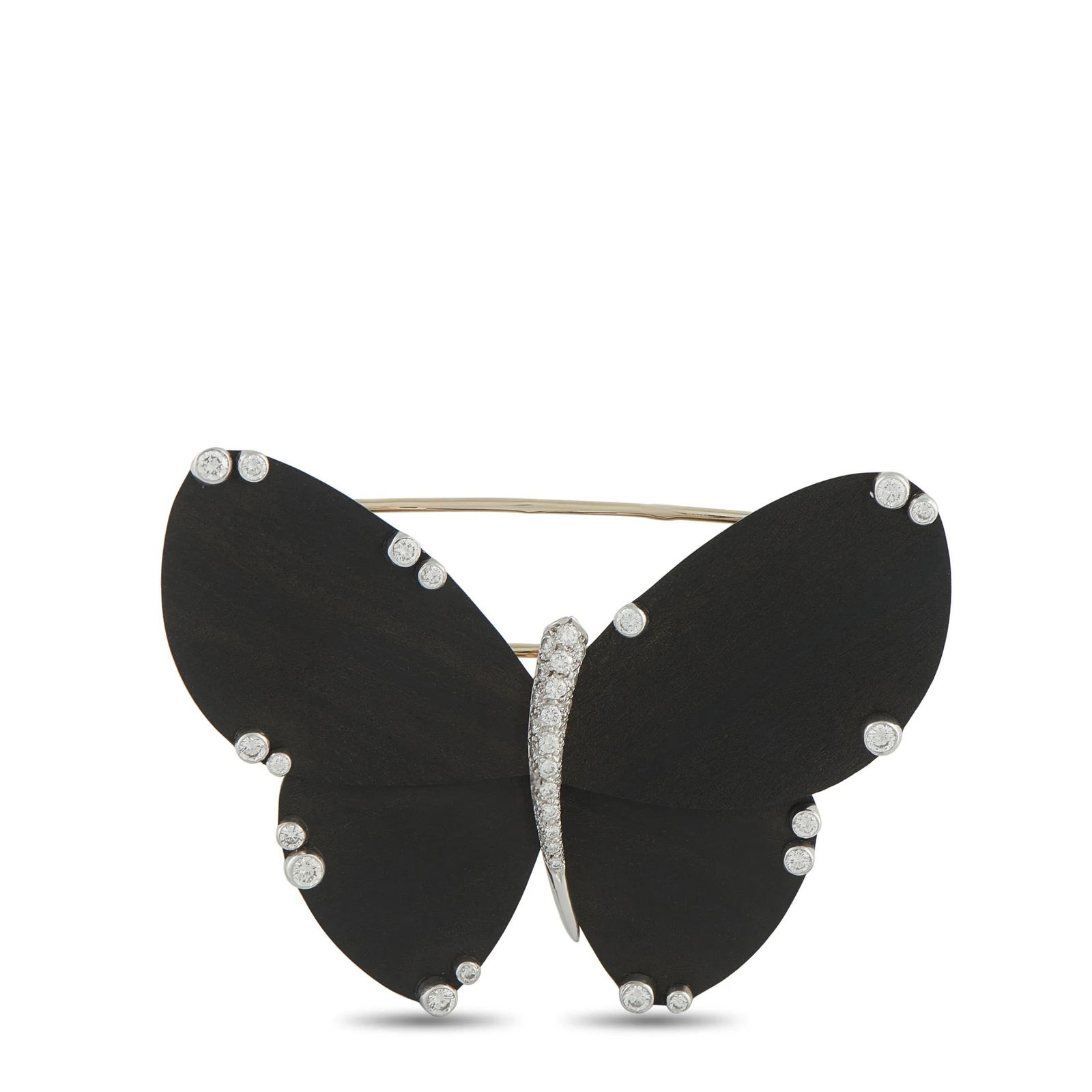 Van Cleef & ArpelsVan Cleef & Arpels 18K White Gold Diamond and Ebony Wood Butterfly Brooch: A Van Cleef & Arpels creation that captures a bold, glamorous spirit in miniature. This butterfly brooch showcases sculpted ebony wood panels for the wings, punctuated with bezel-set diamonds. The pap