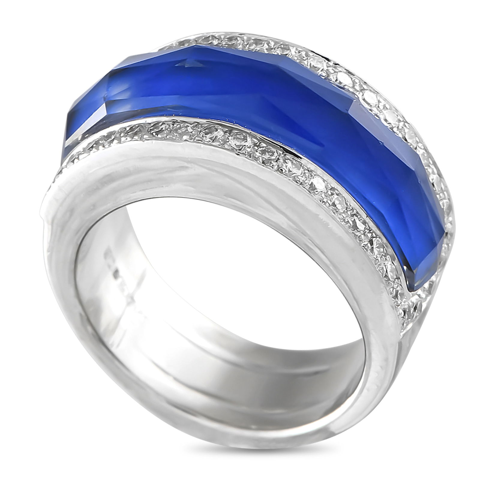 Stephen Webster 18K White Gold 0.30ct Diamond and Crystal Haze Lapis Ring: Dramatic in its deep blue elegance, this Stephen Webster creation is bound to impress. It has a wide band fashioned in solid 18K white gold. The ring features Stephen Webster ’s popular Crystal Haze
