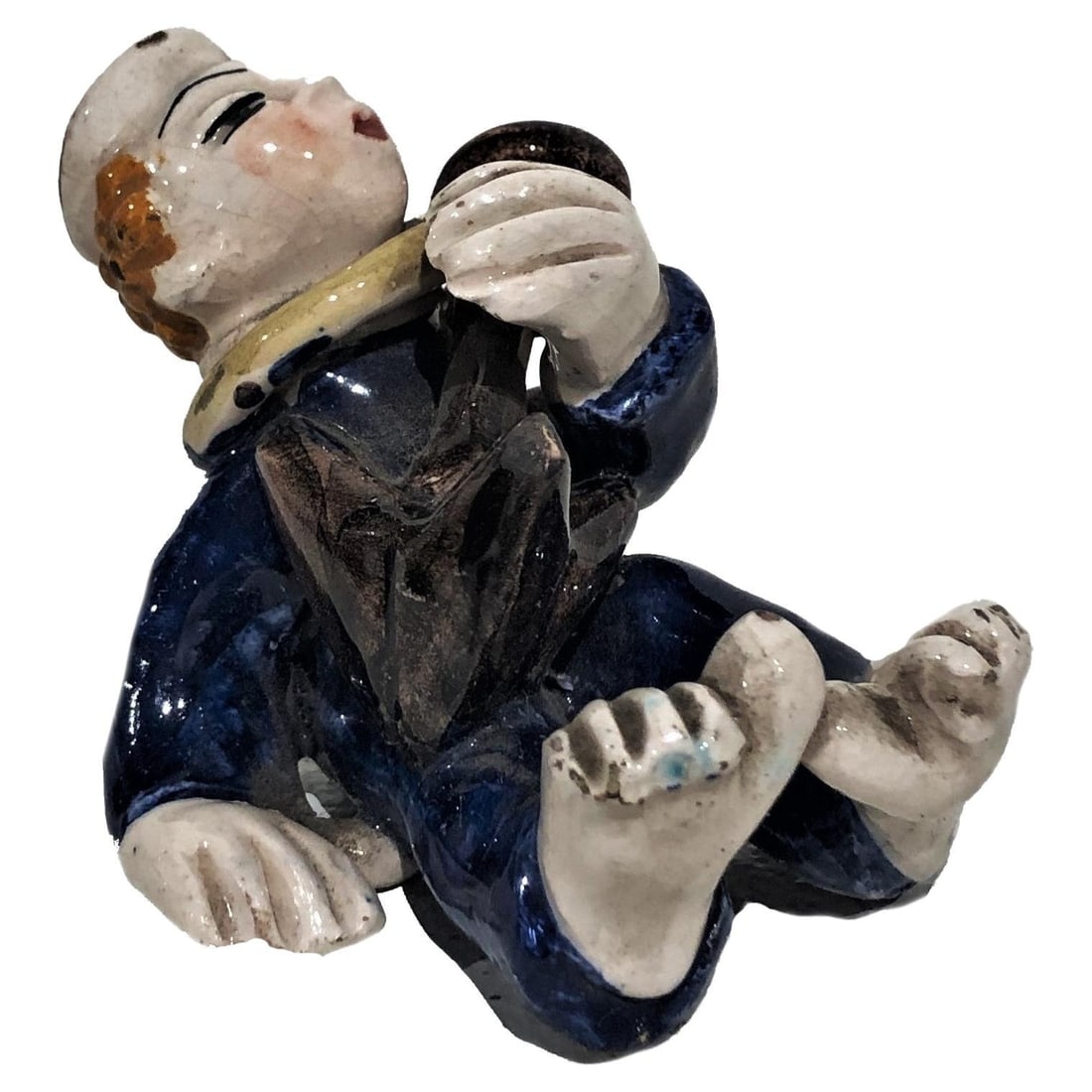 Vally Wiethelthier, Drunken Sailor, Art Deco Art Ceramic Figurine, ca. 1925: ABOUTThis funny, humorous tabletop ceramic figurine depicts a drunken sailor lying on his back. Around his neck is a metal ring with an anchor on it. MARKINGSSigned on the left buttock: "Italy".Dimens