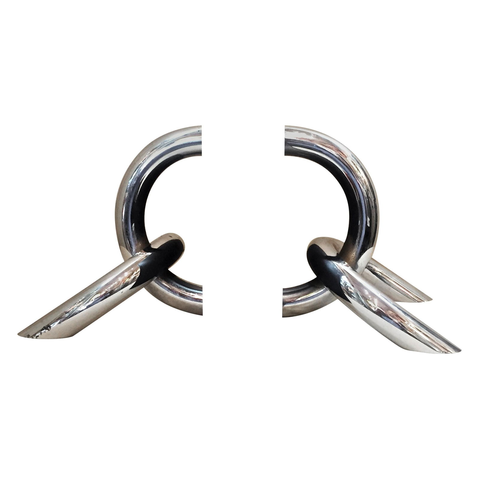 Pair of Italian Architectural Chromed Steel Chain Links Bookends, circa 1970: This pair of extremely heavy chain links bookends are of 1970s Italian Architectural design. Although functional if used as intended, they form a kind of very interesting geometrical sculpture, if use