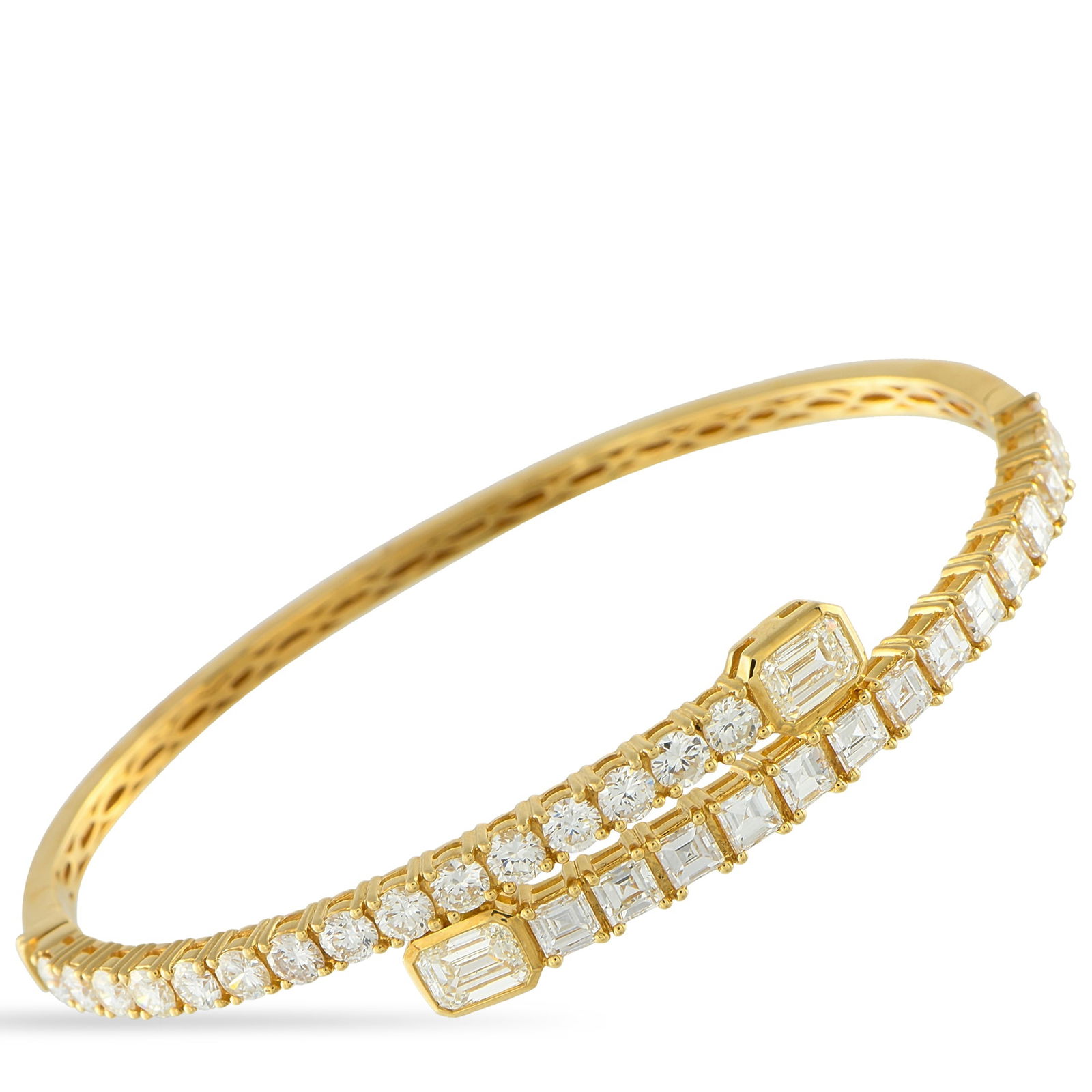 Exclusive 18K Yellow Gold 4.26ct Diamond Bracelet: This Odelia bracelet’s 18K Yellow Gold setting seemingly wraps around the wrist. Ideal for any occasion, it features Ascher cut Diamonds totaling 2.65 carats and emerald cut Diamonds with a total we