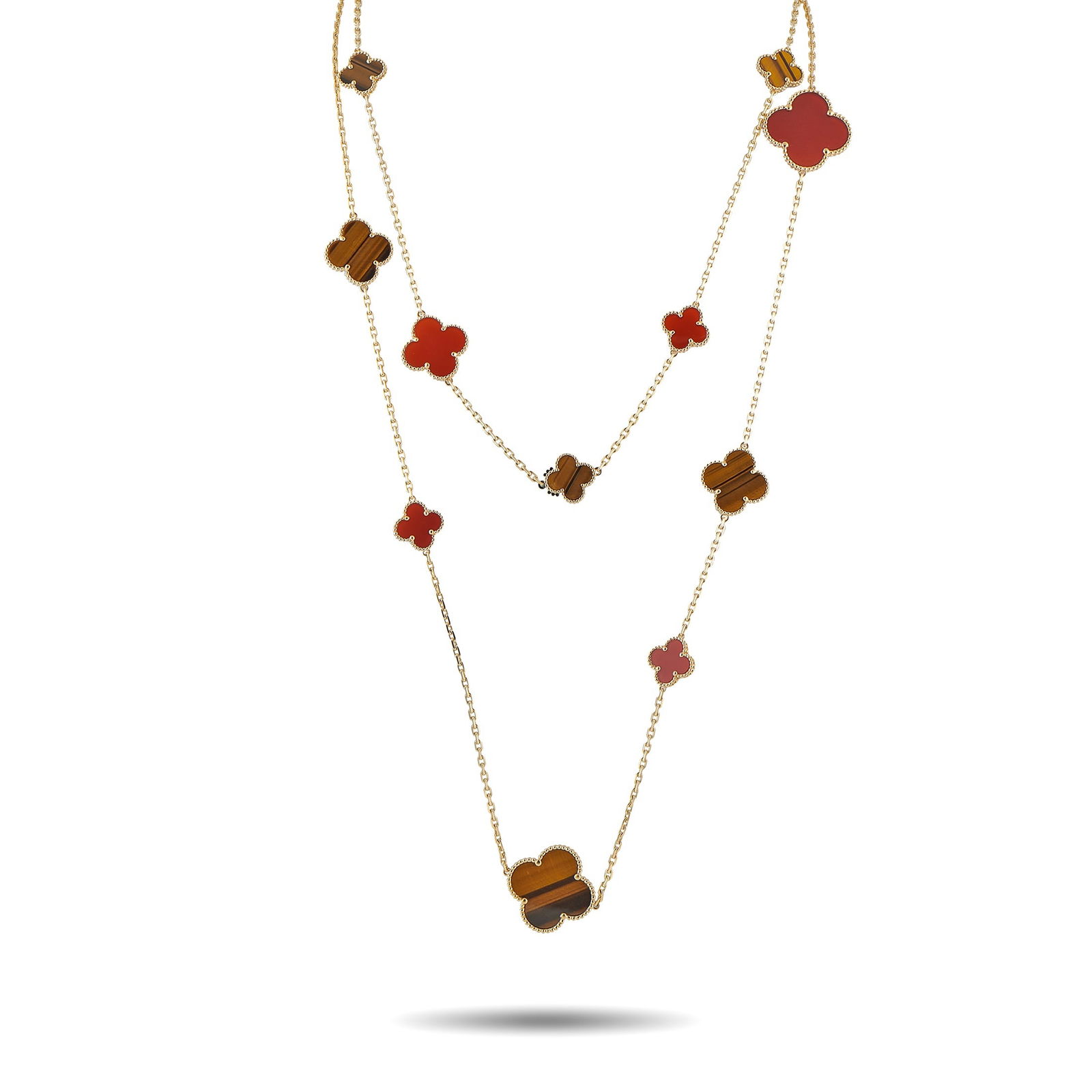 Van Cleef & Arpels Alhambra 18K Yellow Gold Carnelian and Tiger’s Eye 16-Motif Necklace: This Van Cleef & Arpels Alhambra necklace is a luxury piece that will continually captivate. Set in 18K Yellow Gold, 16 of the brand’s timeless clover motifs come to life in alternating Carnelian an