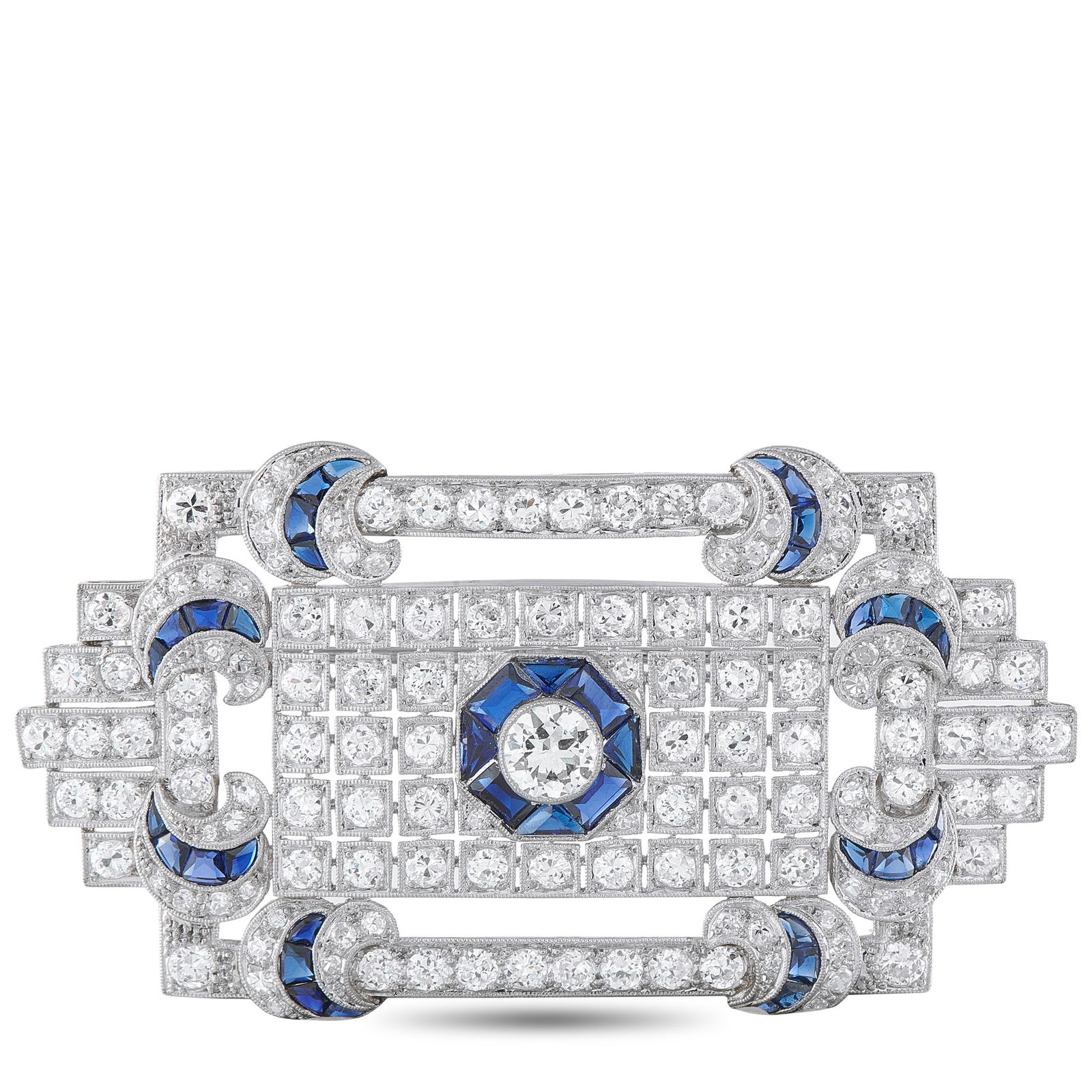 Exclusive Platinum 8.45ct Diamond and Sapphire Brooch: This exquisite brooch will continually impress. The bold, Art Deco design is elevated by the sparkling 0.95 carat Diamond center stone and additional Diamonds with a total weight of 7.50 carats. Sapph