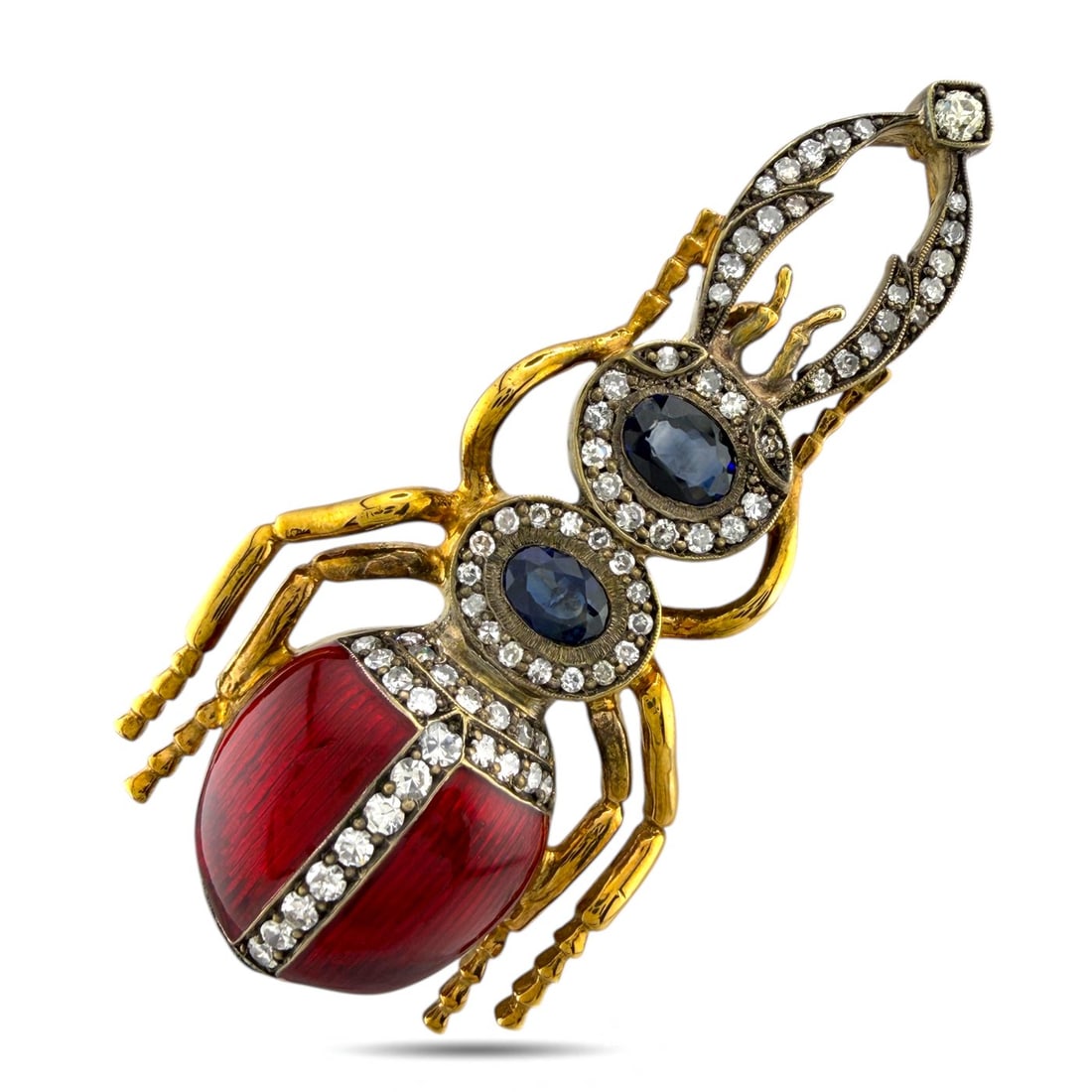 Imperial Russian 56K (14K) Gold, Red Enamel, 1.10ct Diamond & 1.25ct Sapphire Stag Beetle Brooch: Imperial Russian 56K (14K) Gold, Red Enamel, 1.10ct Diamond & 1.25ct Sapphire Stag Beetle Brooch An Imperial Russian stag beetle brooch, masterfully crafted in 56k (14k) gold and richly detailed with
