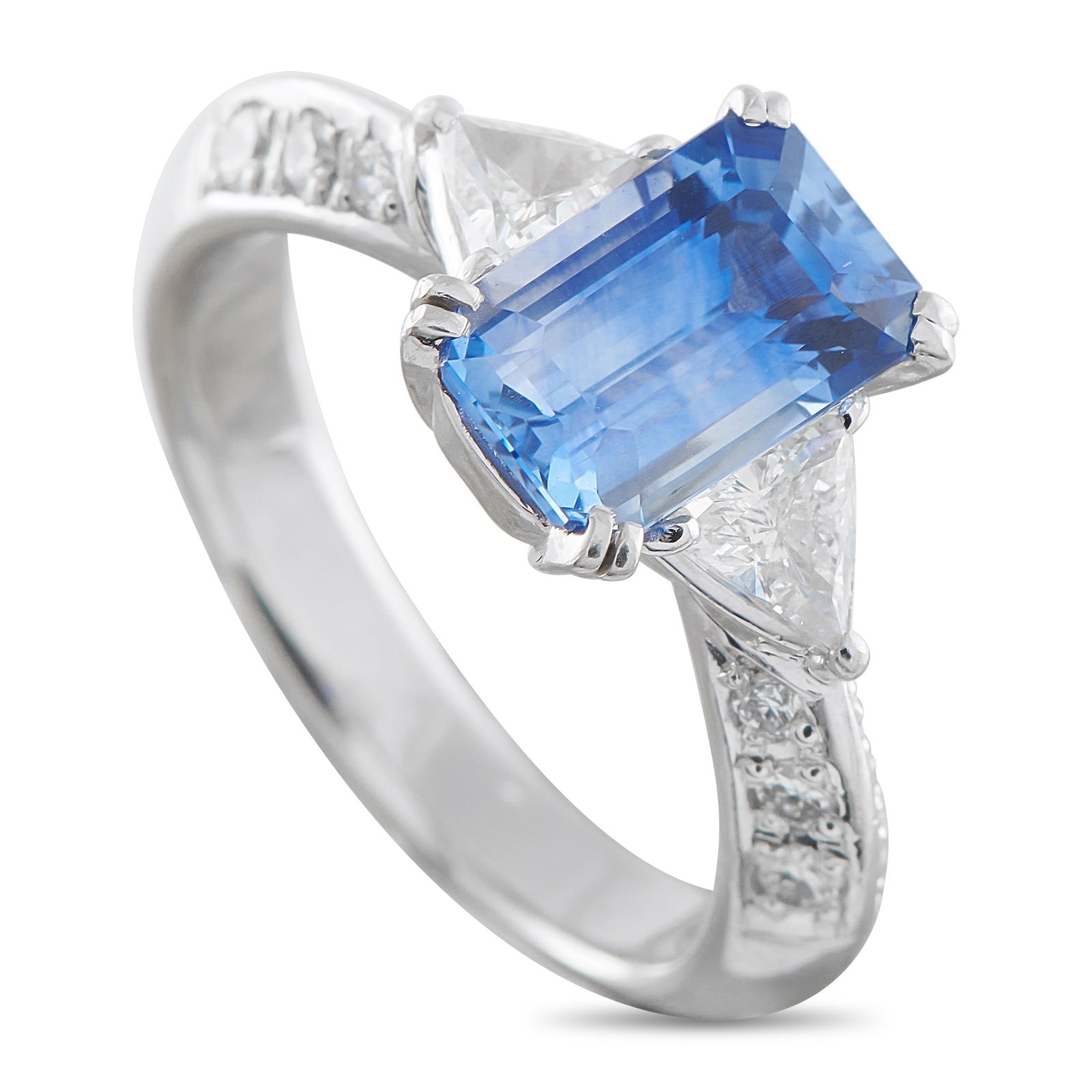Exclusive Platinum 0.73ct Diamond and Sapphire Ring: Designed with defined lines and sharp symmetry, this Exclusive ring takes its character from contrast and control. A 2.71-carat step-cut blue sapphire sits at the center, held by double prongs at each