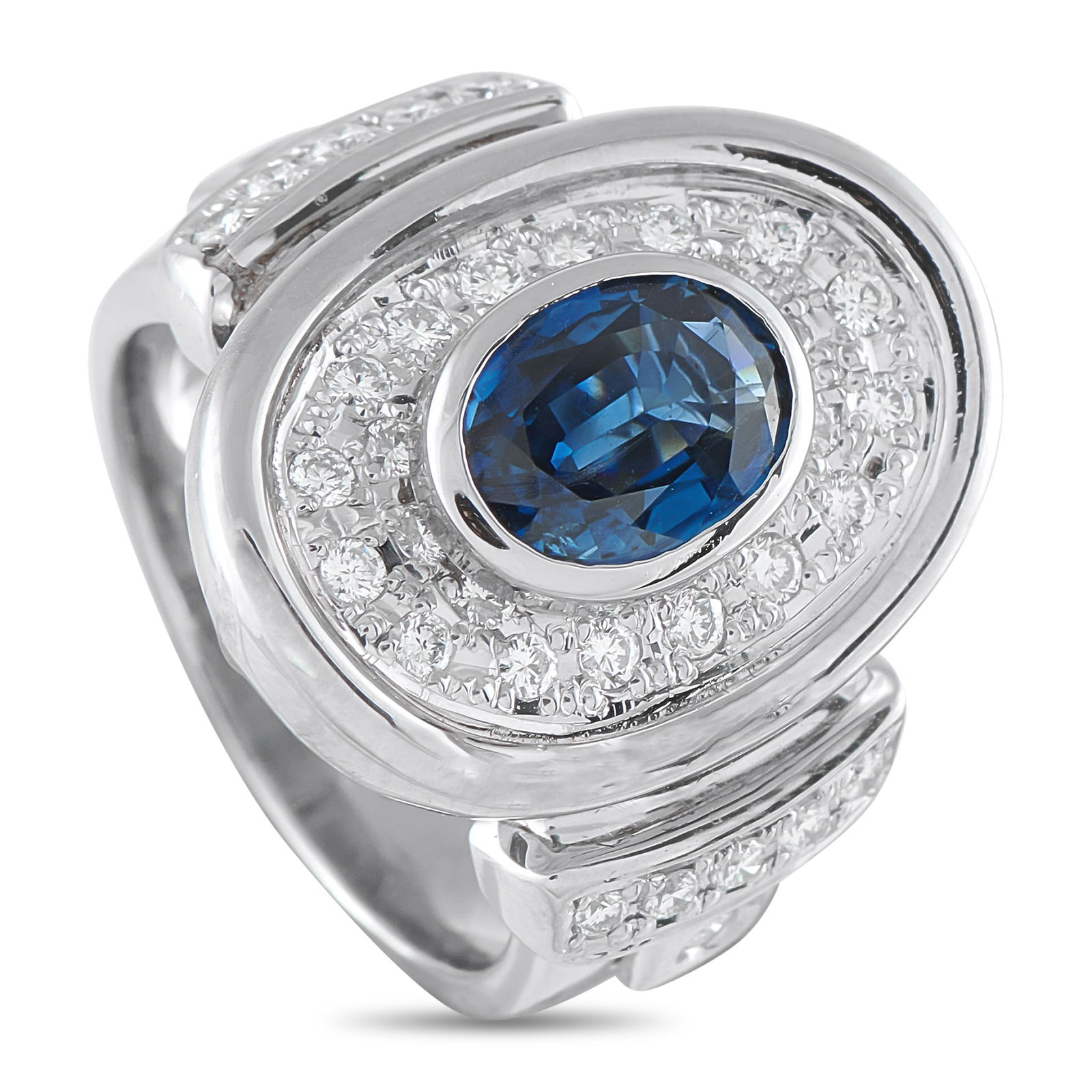 Exclusive Platinum 0.61ct Diamond and Sapphire Ring: A uniquely elegant design makes this ring simply unforgettable. The circular Platinum setting is highlighted by inset Diamonds totaling 0.61 carats. At the center, a 2.06 carat Sapphire serves as a st
