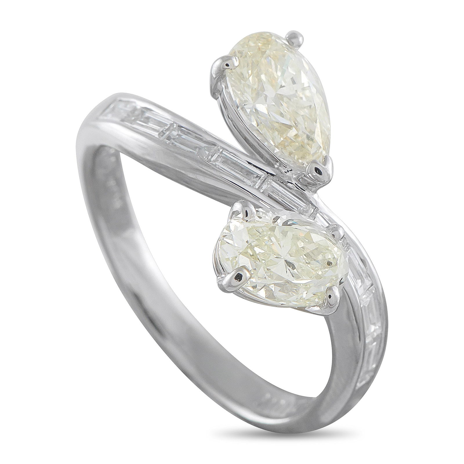 Exclusive Platinum 2.39ct Diamond Ring: Fluid and softly architectural, this Exclusive ring is for someone who prefers jewelry that feels expressive rather than expected. The platinum band presents a curved center channel set by 0.38 carats