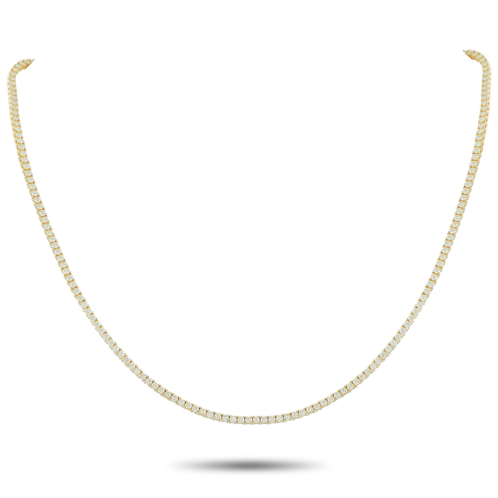 Exclusive 18K Yellow Gold 5.94ct Diamond Tennis Necklace: This classically elegant tennis necklace is designed to effortlessly catch the light. Set in 18K Yellow Gold, sparkling Diamonds totaling 5.94 carats make it a luxury piece worthy of any event or occa