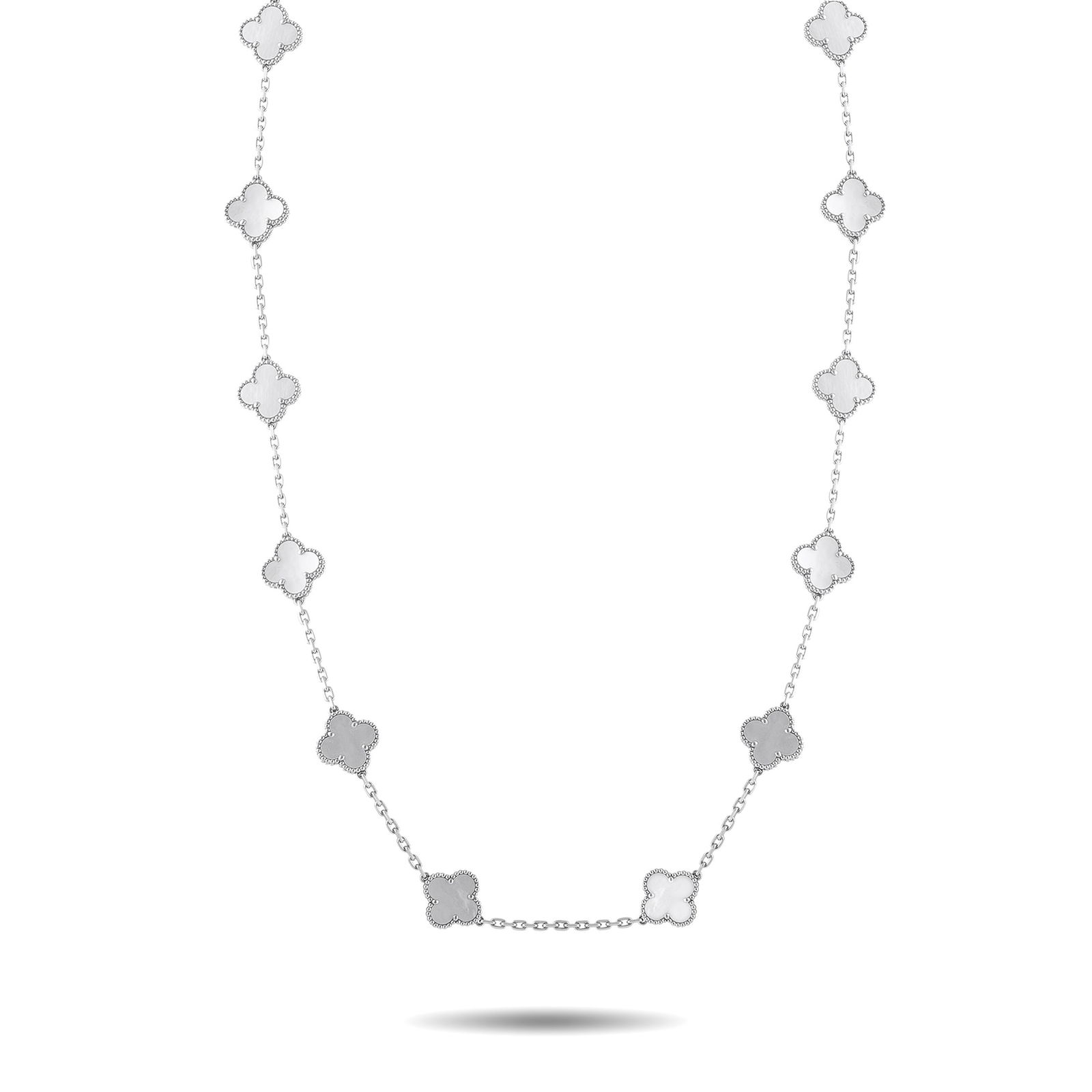 Van Cleef & Arpels Alhambra 18K White Gold 20-Motif Mother-of-Pearl Long Necklace: A white gold Alhambra necklace set with 20 clover motifs in luminous white mother-of-pearl. Spanning 34 inches and weighing 52.5 grams, this piece wears lightly, even at its full length. Each Alhambra