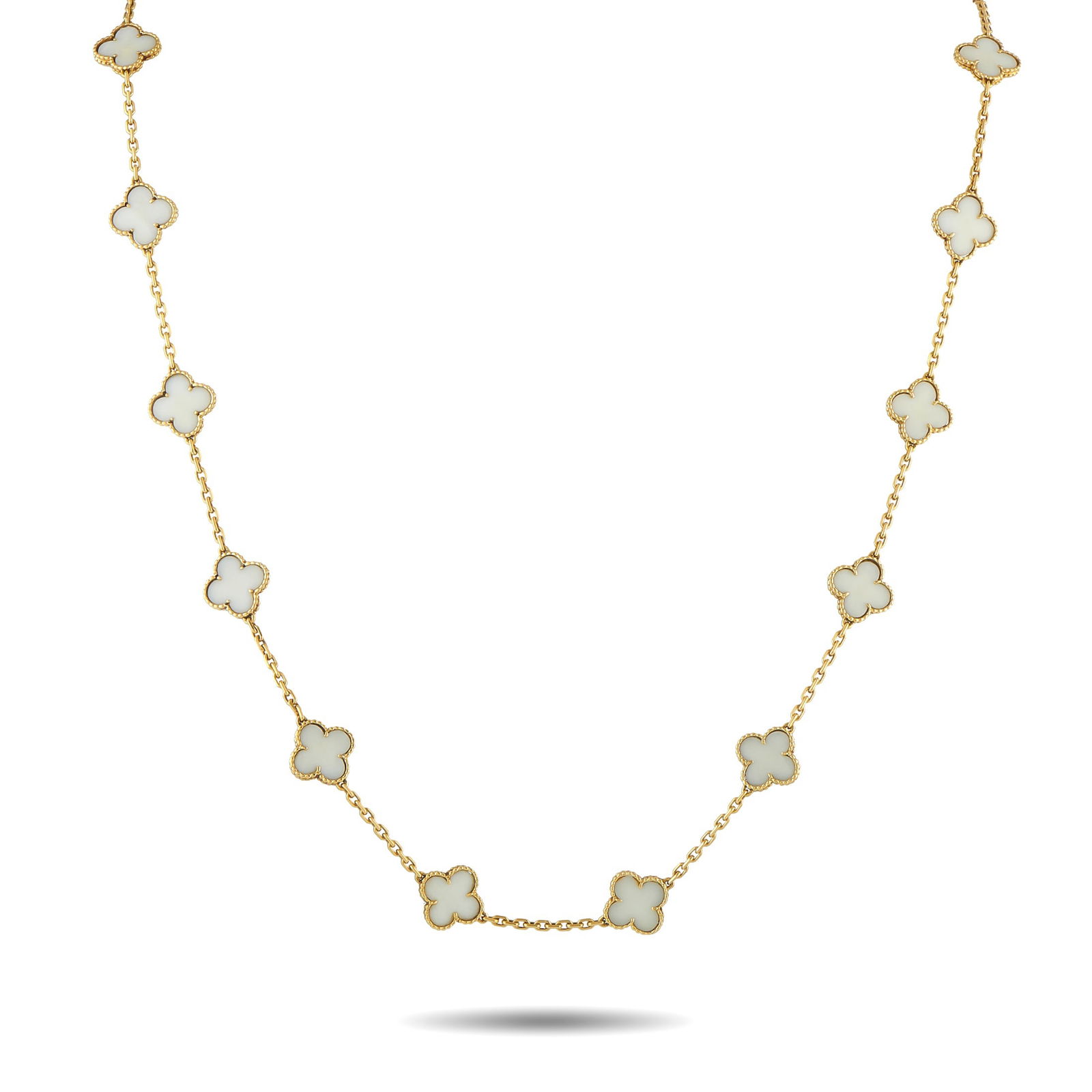 Van Cleef & Arpels Vintage Alhambra 18K Yellow Gold White Coral 20-Motif Necklace: This Van Cleef & Arpels Vintage Alhambra necklace is an instantly recognizable piece that exudes timeless luxury. Crafted from 18K Yellow Gold, a series of 20 of the brand’s iconic clover-shaped mot