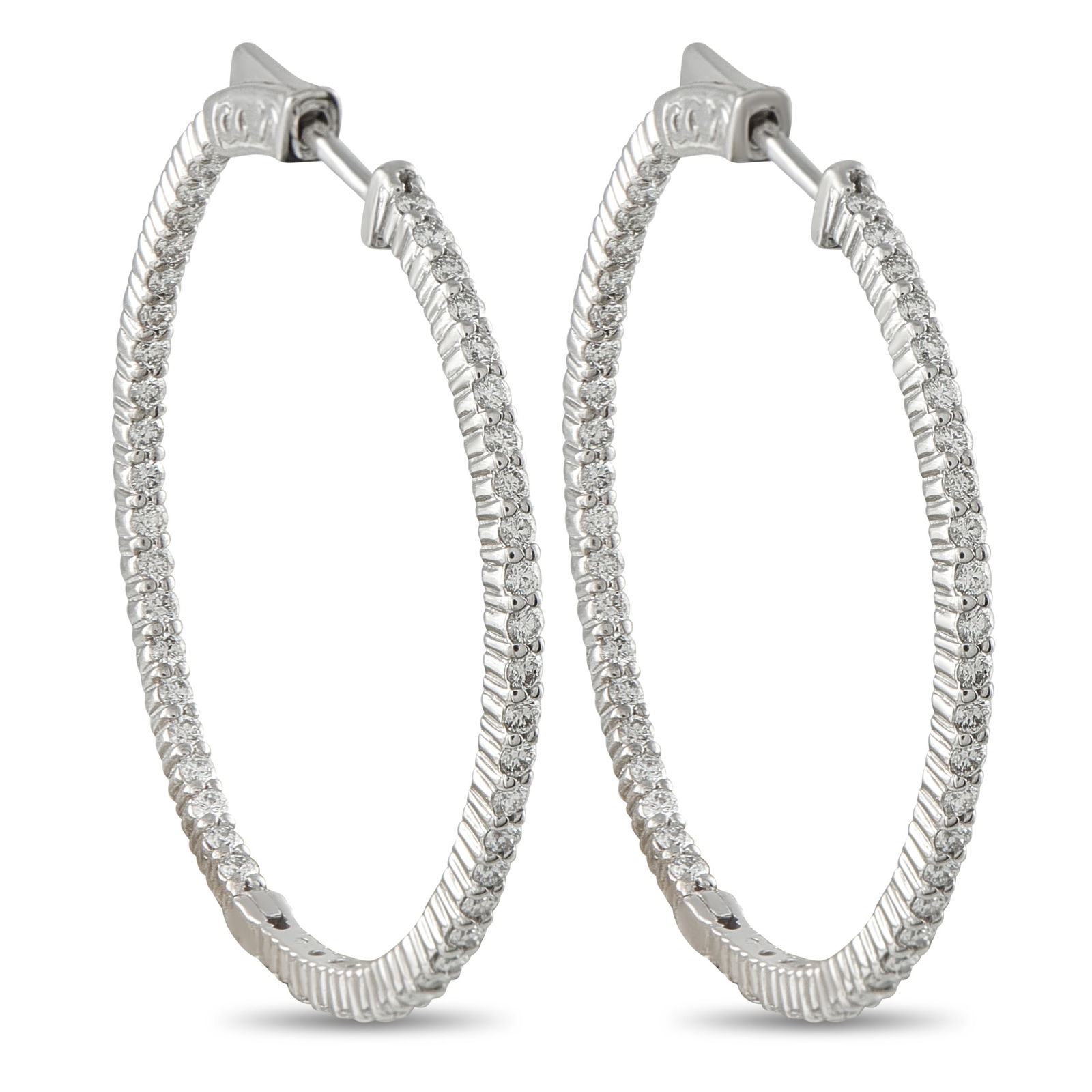 Exclusive 14K White Gold 2.0ct Diamond Inside-Out Hoop Earrings: These classic hoop earrings will instantly add a touch of luxury to any ensemble. Diamonds with a total weight of 2.0 carats make them come alive every time they catch the light. Set in 14K White Gold