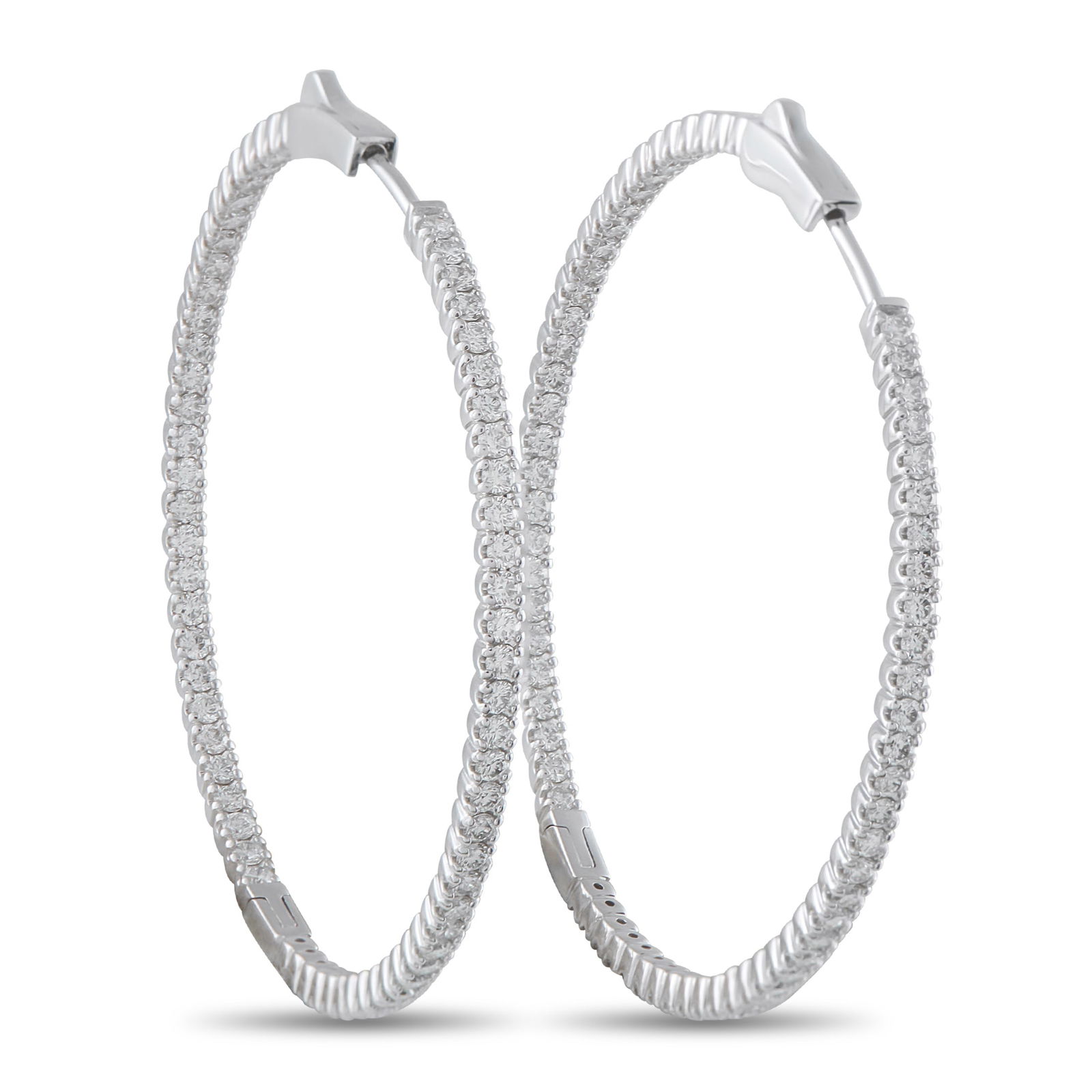 Exclusive 14K White Gold 2.02ct Diamond Inside-Out Hoop Earrings: These dazzling hoop earrings will put the perfect finishing touch on any ensemble. Sleek and stylish, the classic design comes to life thanks to sparkling Diamonds with a total weight of 2.02 carats.