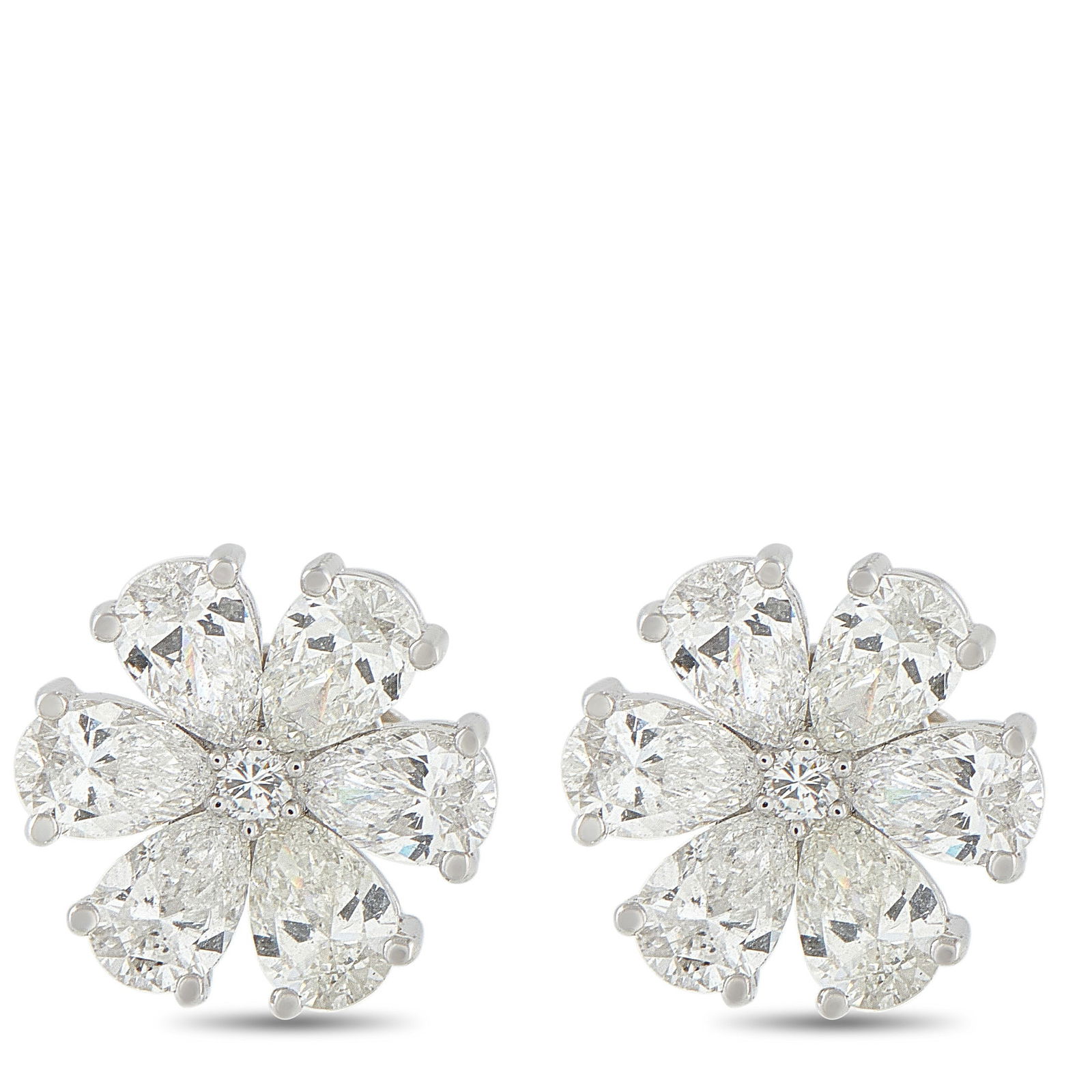Exclusive 18K White Gold 2.70ct Diamond Flower Earrings: These Exclusive stud earrings turn a classic floral motif into something more architectural and captivating. A petite round diamond lies at the center of each stud, surrounded by six pear-cut diamonds