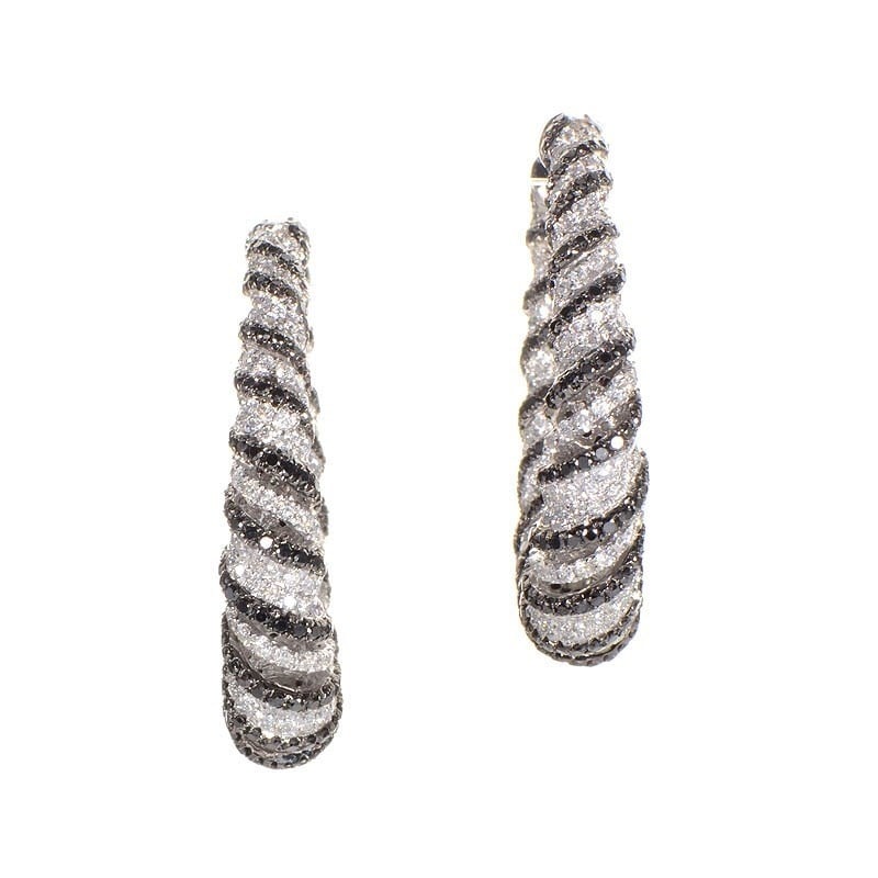18K White Gold Zebra Hoop Earrings: This pair of hoop earrings are fun and flirty. These earrings are made of 18K white gold and are set with ~7.83ct of black and white diamonds.