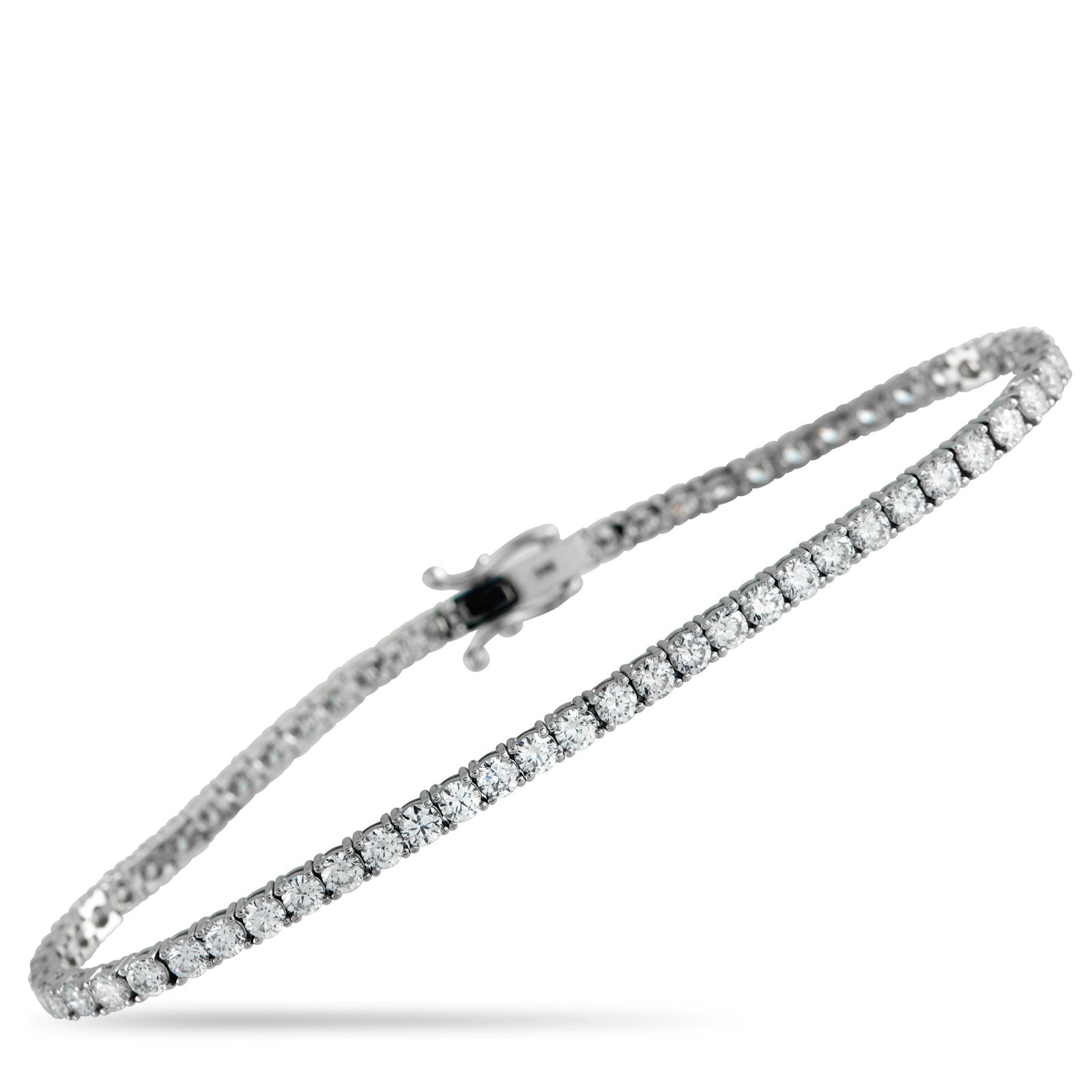 Exclusive 14K White Gold 5.05ct Lab-Grown Diamond Tennis Bracelet: Add a touch of luxury to any ensemble with this tennis bracelet. The understated 14K White Gold setting allows Lab Grown Diamonds totaling 5.05 carats to take center stage. This elegant accessory meas