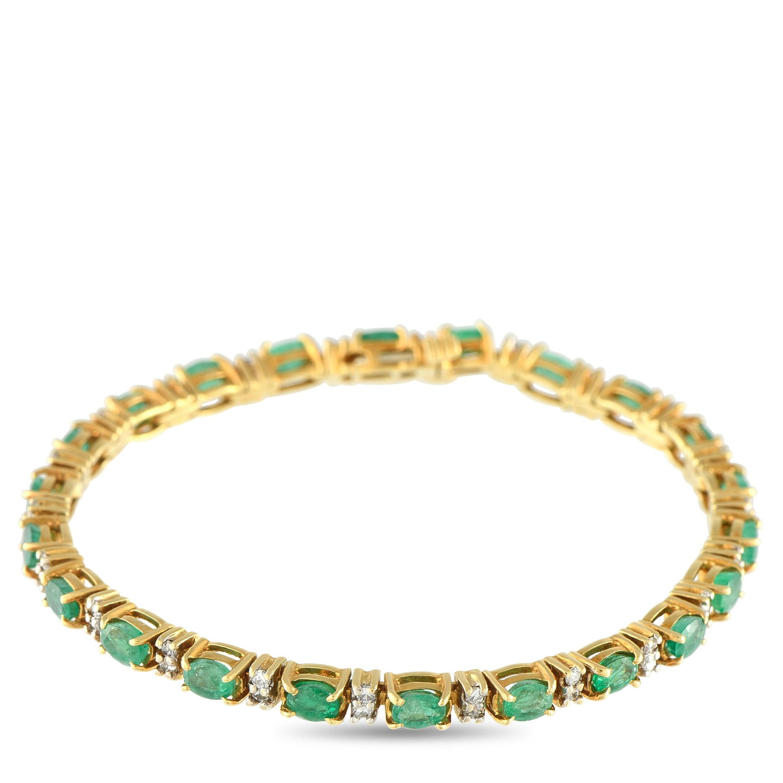 Exclusive 18K Yellow Gold 5.50ct Emerald and Diamond Bracelet: Emeralds and diamonds are in perfect rhythm in this Exclusive bracelet. The piece showcases alternating oval-cut emeralds and diamond duos, creating a line of color and brilliance. This elegant yet ve