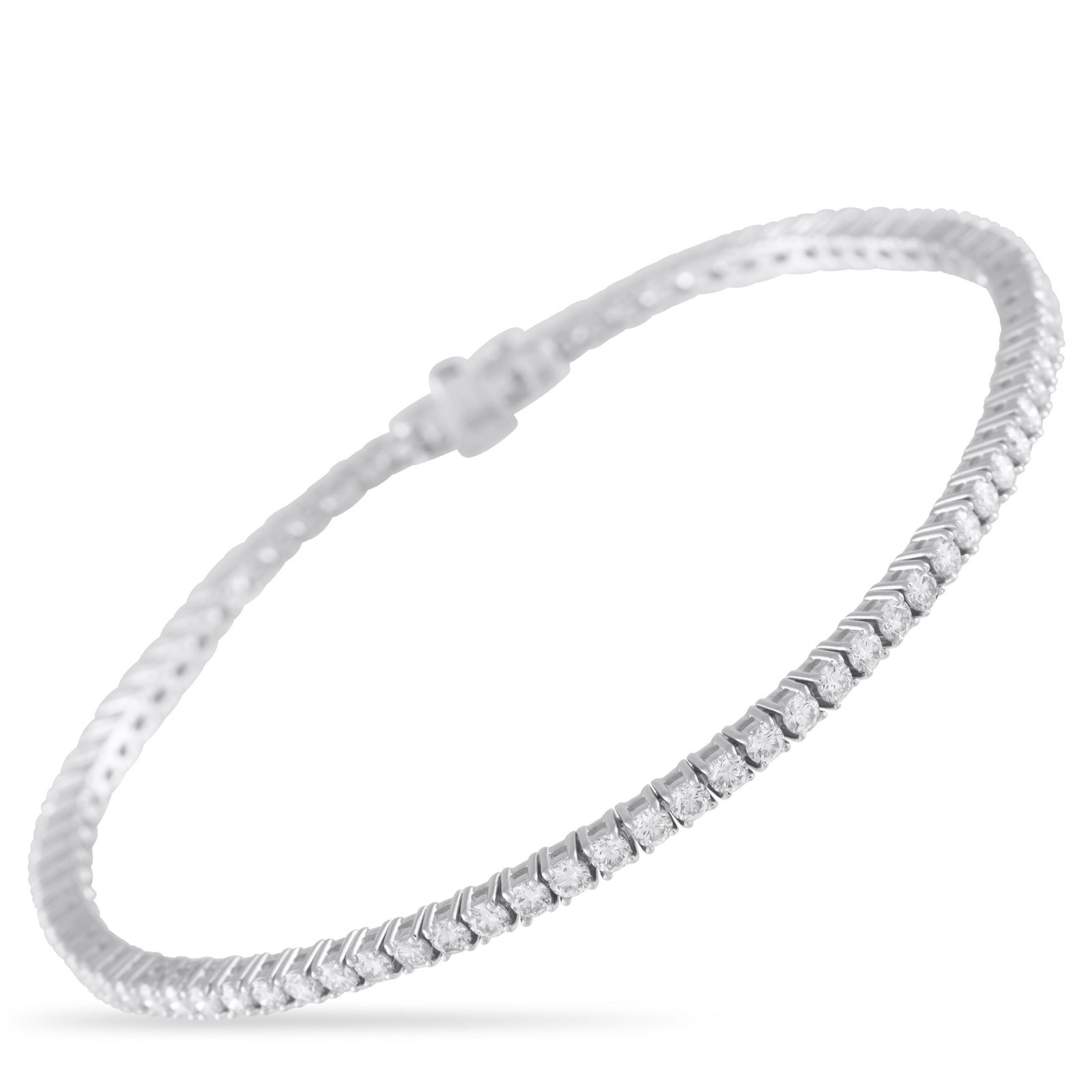 Exclusive 18K White Gold 3.10ct Diamond Tennis Bracelet: This classic tennis bracelet will always make a stylish statement. Diamonds with a total weight of 3.10 carats shine brightly from their place within the simple 18K White Gold setting. Sophisticated e