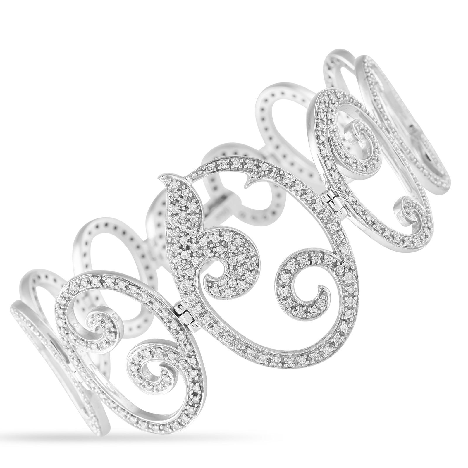 Tous 18K White Gold 3.25ct Diamond Bracelet: This Tous bracelet is delicate and dynamic in design. The intricate 18K White Gold setting beautifully showcases a breathtaking array of inset Diamonds, which together possess a total weight of 3.25 c