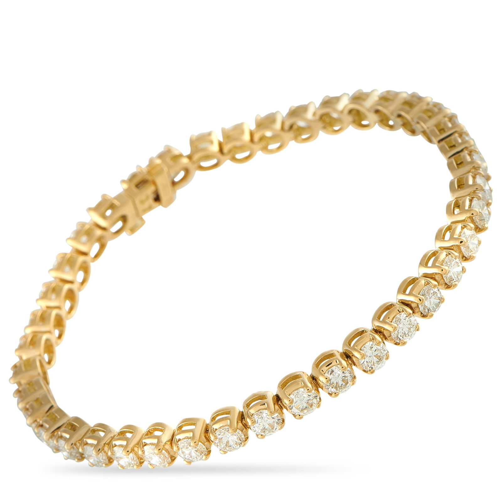Exclusive 18K Yellow Gold 7.45ct Diamond Tennis Bracelet: A jewelry staple fit for everyday wear and special occasions. This 18K yellow gold tennis bracelet showcases 7.45 carats of round diamonds, each meticulously set in a U-shaped prong basket. The precis