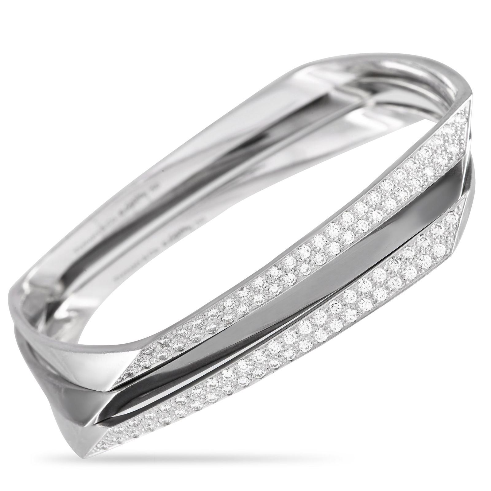 Tiffany & Co. Gehry 18K White Gold 1.20ct Diamond Bracelet: This Tiffany & Co. Gehry Bracelet Set features a trio of uniquely elegant 18K White Gold bangle bracelets. Meant to be worn together as a stacked set, each piece features clean lines and a distinctly