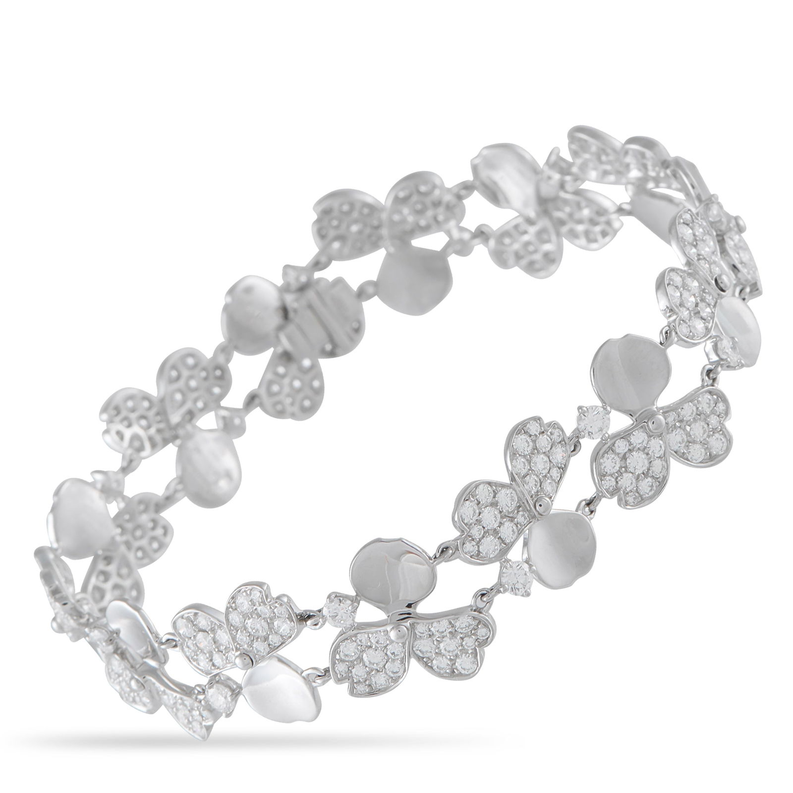 Tiffany & Co. Paper Flowers Platinum 4.26ct Diamond Bracelet: This Tiffany & Co. Paper Flowers bracelet is incredibly delicate in design. Along with an array of exquisite floral motifs, it comes complete with sparkling inset Diamonds totaling 4.26 carats. Chic a