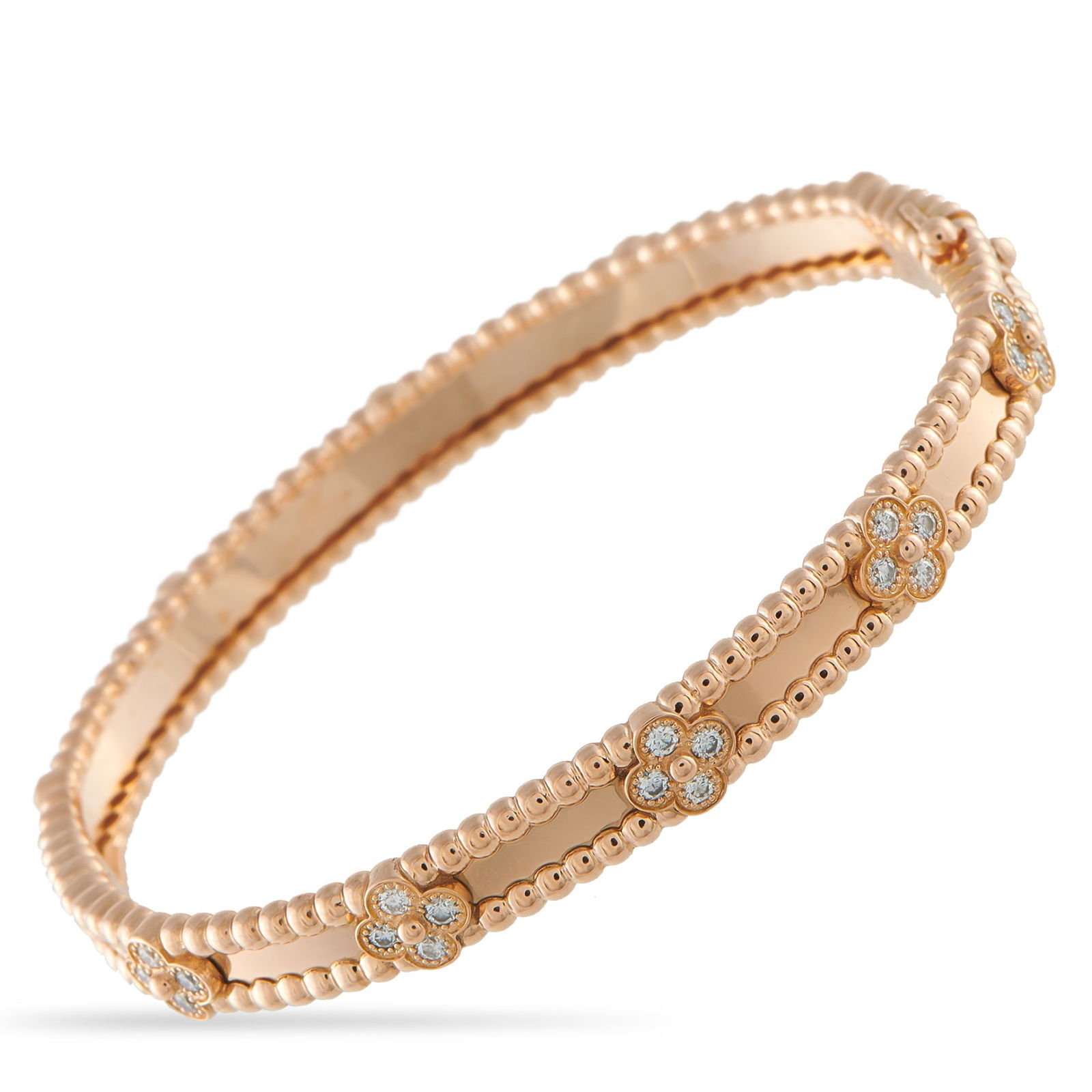 Van Cleef & Arpels Perlee 18K Rose Gold Bracelet: Beaded elements make this Van Cleef & Arpels Perlee bracelet sleek, elegant, and incredibly luxurious. Crafted from opulent 18K Rose Gold, the luxury brand’s iconic clover motif makes a statement th