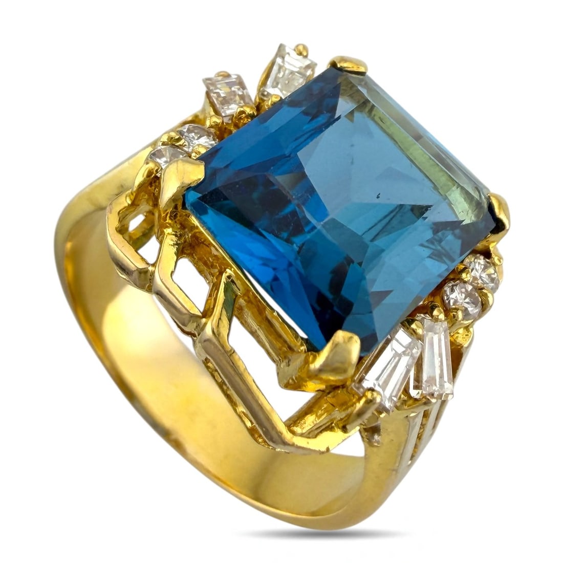 Ring - 14 kt. Yellow gold, Exclusive 14K Yellow Gold Emerald Cut Blue Topaz 0.44ct Halo Diamond: Exclusive 14K Yellow Gold Blue Topaz & 0.44ct Diamond RingThis elegant ring is crafted in polished 14K yellow gold and features a vibrant emerald-cut blue topaz weighing 0.44 carats, framed by a halo