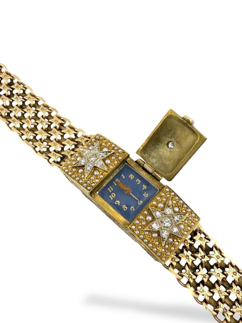 Bracelet - 14 kt. Yellow gold, 14K Yellow Gold Watch and Blue Enamel 0.27ct Diamond Bracelet -: 14K Yellow Gold Watch and Blue Enamel 0.27ct Diamond BraceletAn elegant fusion of color and craftsmanship, this 14K yellow gold watch bracelet is beautifully accented with rich blue enamel detailing.