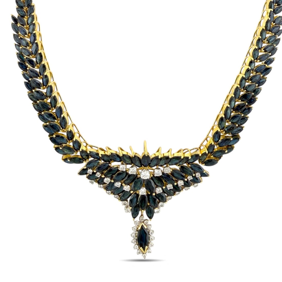 Necklace - 18 kt. Yellow gold, Exclusive 18K Yellow Gold 49.38ct Sapphire and 1.38ct Diamond: Exclusive 18K Yellow Gold 49.38ct Sapphire and 1.38ct Diamond Necklace This magnificent sapphire and diamond necklace features an elegant flexible design that drapes smoothly along the neckline. Craft