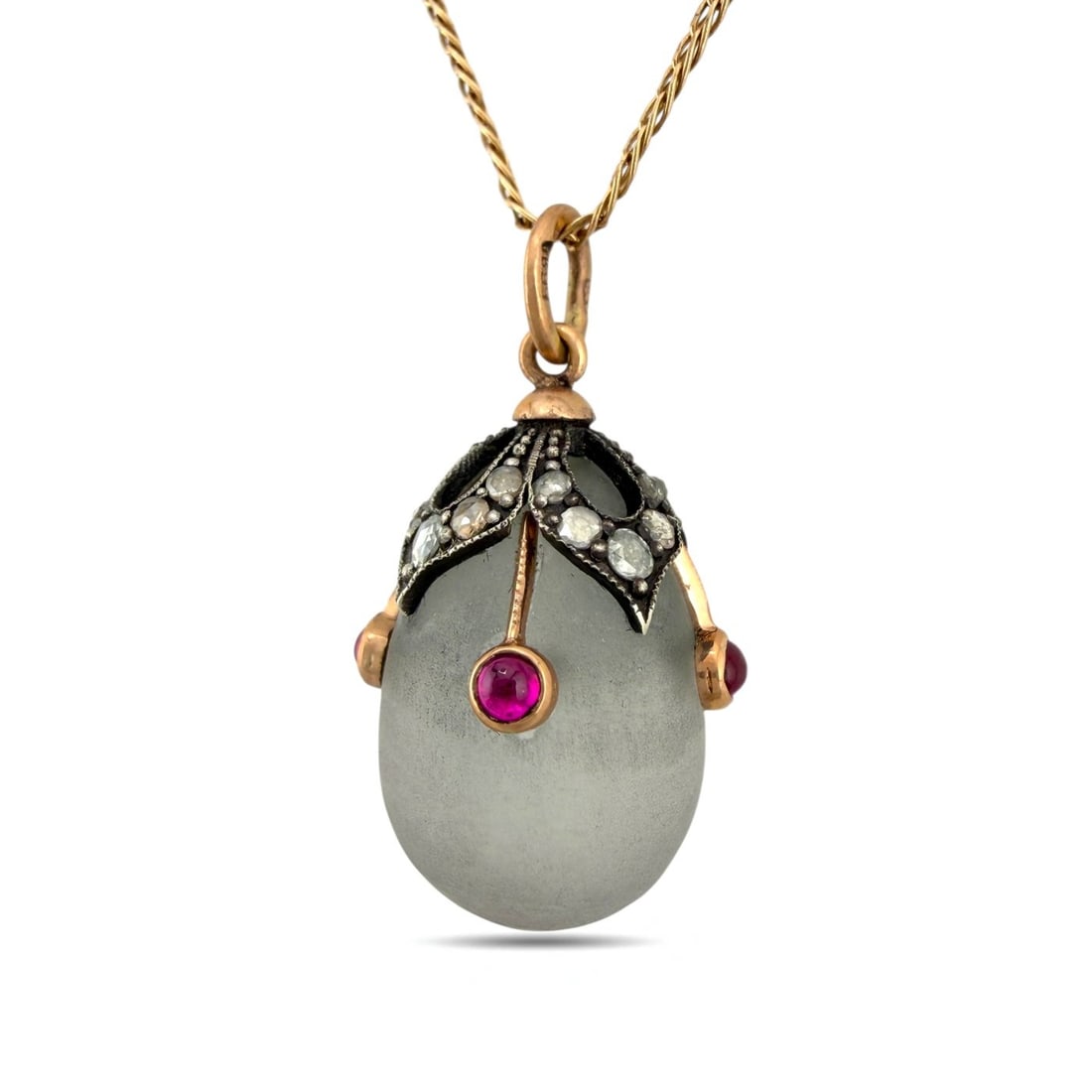 Pendant - 14 kt. Yellow gold, Imperial Russian Ruby Diamond Jeweled 56K Rose Gold & Enamel Egg: Imperial Russian Ruby Diamond Jeweled 56K Rose Gold & Enamel Egg Pendant — Marked Karl FabergéA superb and rare Imperial Russian jeweled egg pendant, crafted in 56K (14K) rose gold, decorated with