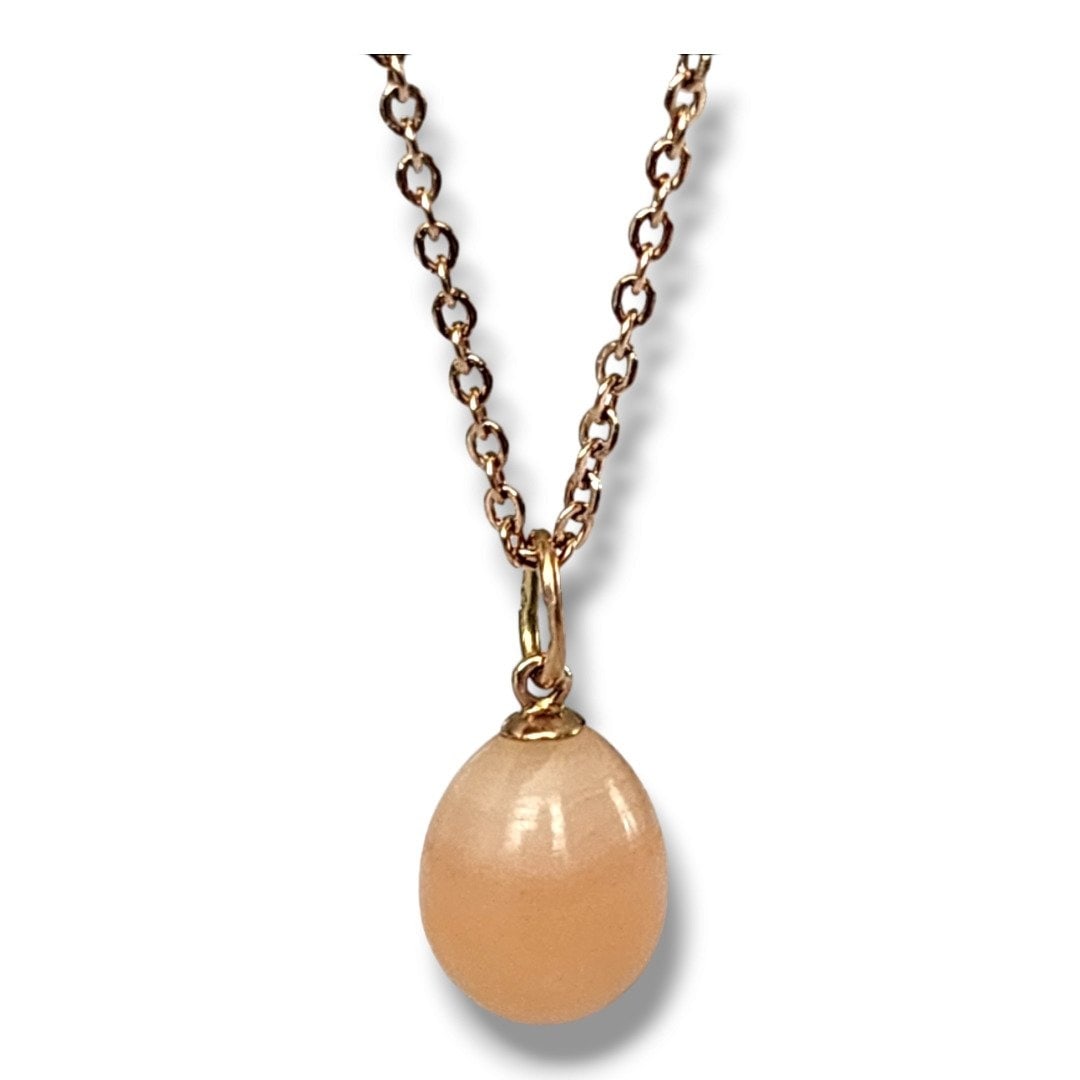 Pendant A. Thielemann / K. Faberge Antique Russian 56k ( 14k) Gold Egg Pendan: A Fabergé Firm Work Master A. Thielemann jewelled gold and Enamel egg pendant in shape of Love workmaster Alfred Thielemann, St Petersburg, 1899-1903Work Master: A. Thielemann, a Fabergé workmaster