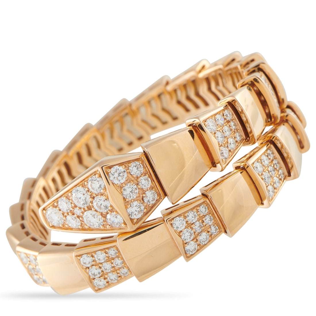 BVLGARI Serpenti 18K Rose Gold 4.67ct Diamond Bracelet Size Small: BVLGARI Serpenti 18K Rose Gold 4.67ct Diamond Bracelet Size Small Tactile, powerful, unmistakable, the Bvlgari Serpenti bangle asserts itself through form and presence. Cast in rose gold and weighing