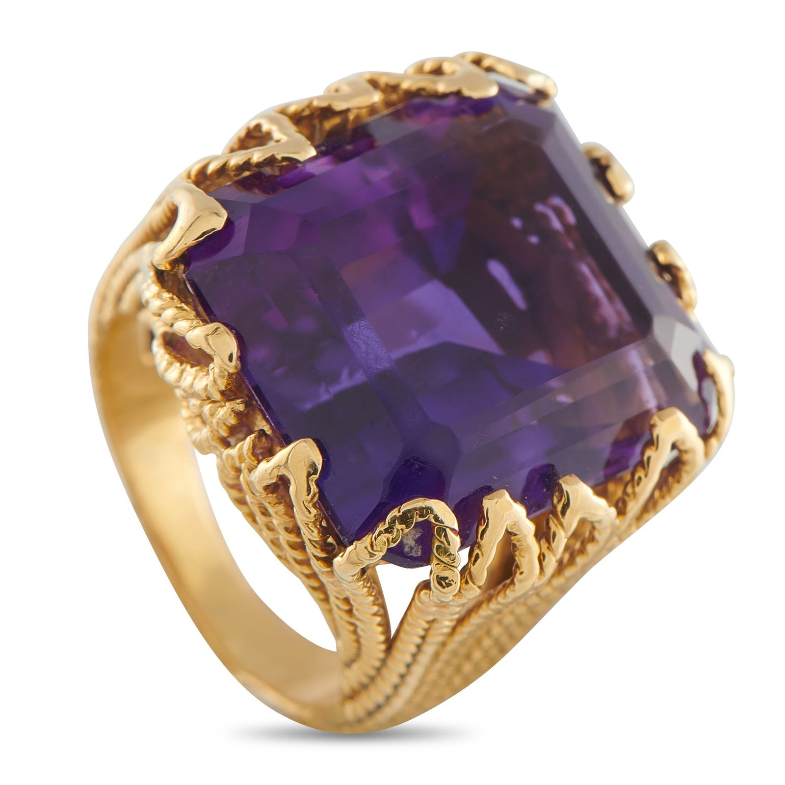 David Webb 18K Yellow Gold 25ct Amethyst Ring: A 25.0 carat Amethyst gemstone sits at the center of a textured 18K Yellow Gold setting on this David Webb ring. Bold, stylish, and impossible to ignore, this impressive piece features a 4mm wide band