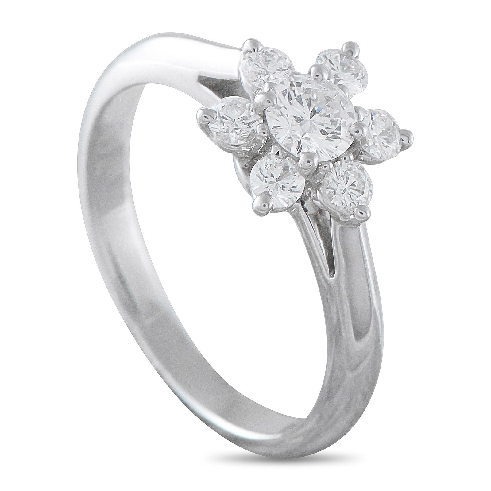 Tiffany & Co. Platinum 0.45ct Diamond Cocktail Ring: Sparkling Diamonds totaling 0.45 carats resemble a flower at the top of this exquisite Tiffany & Co. cocktail ring. Perfectly understated, it will look elegant when worn alone or can also be paired wi