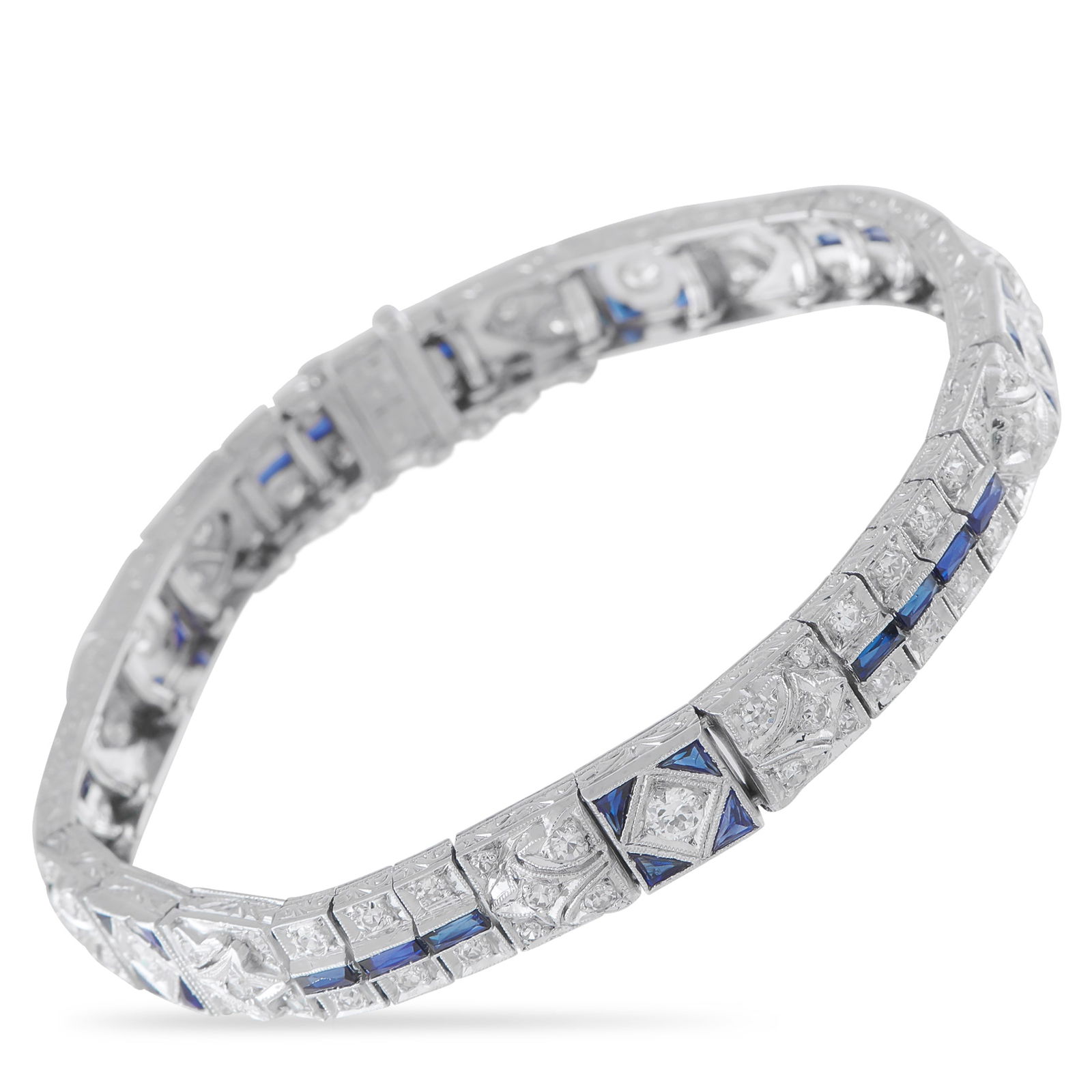 Exclusive Art Deco Platinum 2.70ct Diamond and Sapphire Bracelet: This impeccable bracelet features all the hallmarks of the Art Deco era. Sparkling Diamonds with a total weight of 2.70 carats make a statement from their place within the simple Platinum setting. Sap