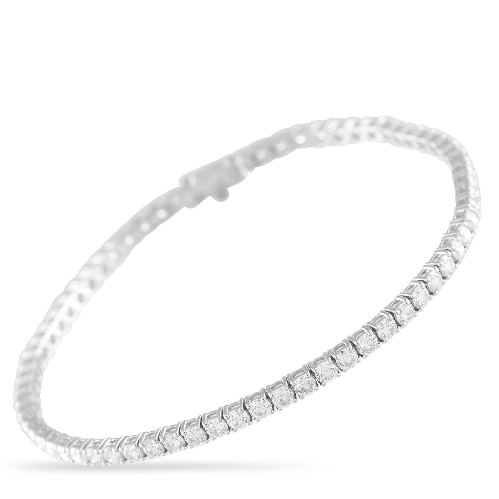 Exclusive 14K White Gold 4.65ct Diamond Tennis Bracelet: No outfit is complete without a subtle touch of sparkle. On this timeless tennis bracelet, the simple 14K White Gold setting comes to life thanks to a series of round-cut Diamonds totaling 4.65 carats