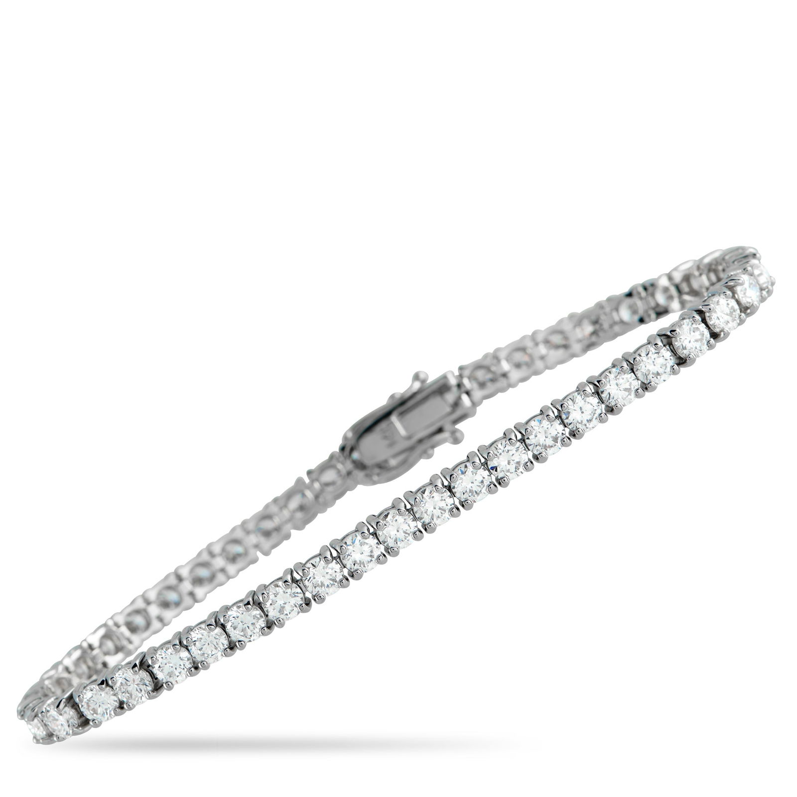 Exclusive 14K White Gold 8.80ct Lab-Grown Diamond Tennis Bracelet: This simple, elegant tennis bracelet will never go out of style. Set in 14K White Gold, Lab Grown Diamonds with a total weight of 8.80 carats allow it to come alive every time it catches the light. It