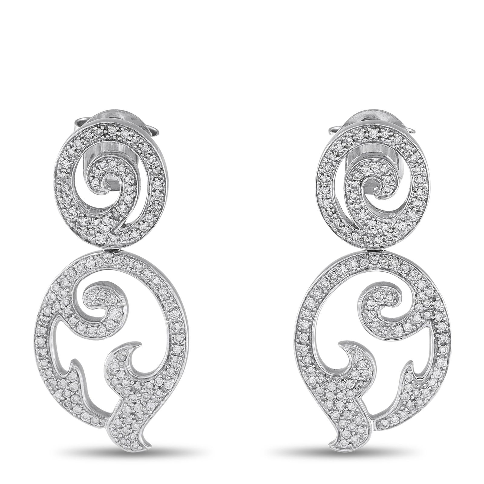 Tous 18K White Gold 1.75ct Diamond Earrings: These intricate Tous earrings are designed to continually catch the light. The intricate design is crafted from 18K White Gold. Diamonds with a total weight of 1.75 carats elevate the intricate openwo
