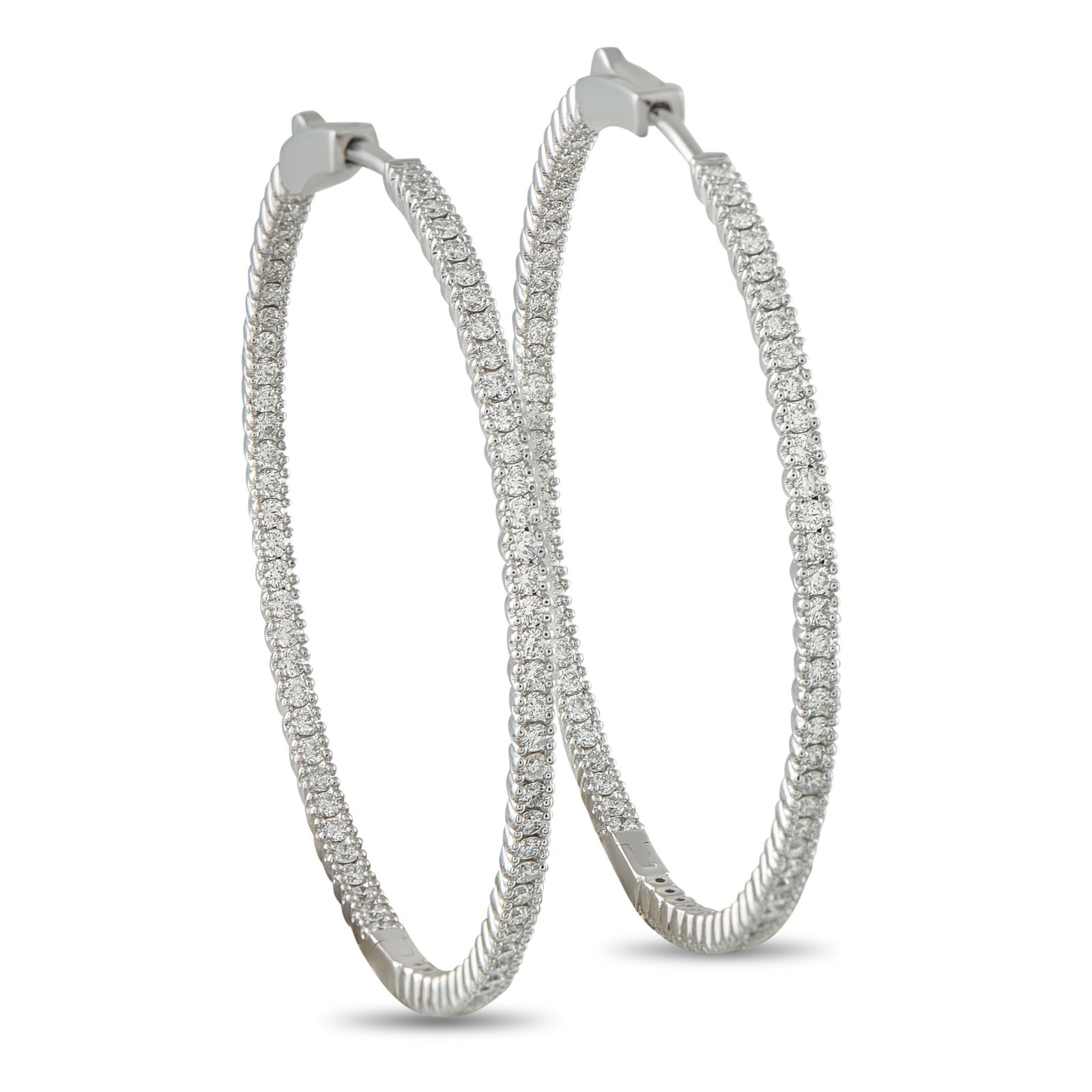 Exclusive 14K White Gold 1.56ct Diamond Inside-Out Hoop Earrings: Add a touch of sophistication to any outfit with these elegant hoop earrings. Crafted from 14K White Gold, the classic design is elevated by sparkling Diamonds totaling 1.56 carats. Each earring measu