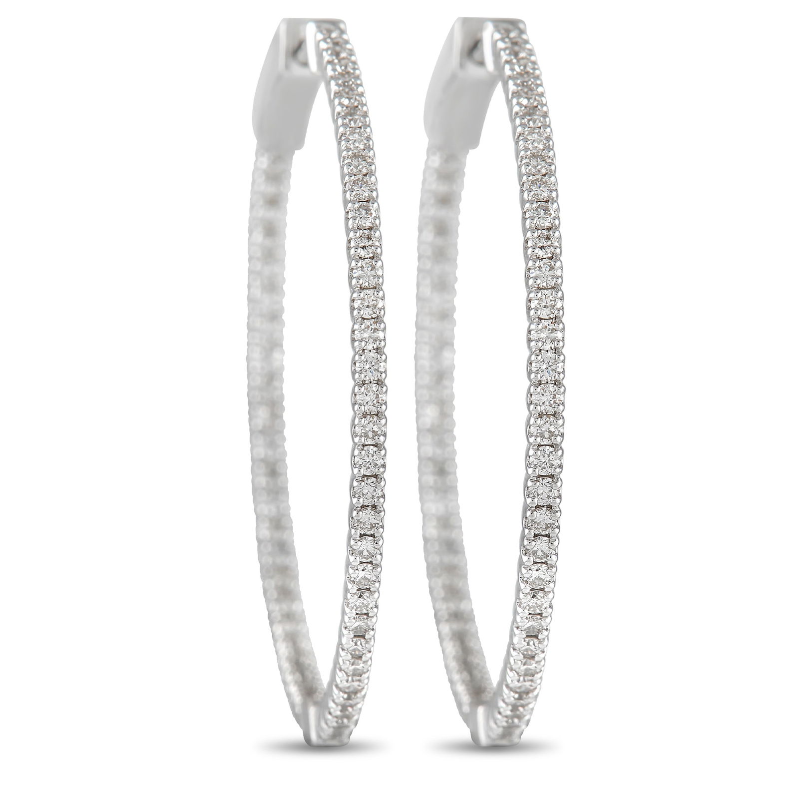 Exclusive 14K White Gold 1.34ct Diamond Inside-Out Hoop Earrings: No luxury jewelry collection is complete without a pair of diamond hoop earrings. Each one of these exquisite earrings features a shimmering 14K White Gold setting that measures 1.5” round. Diam