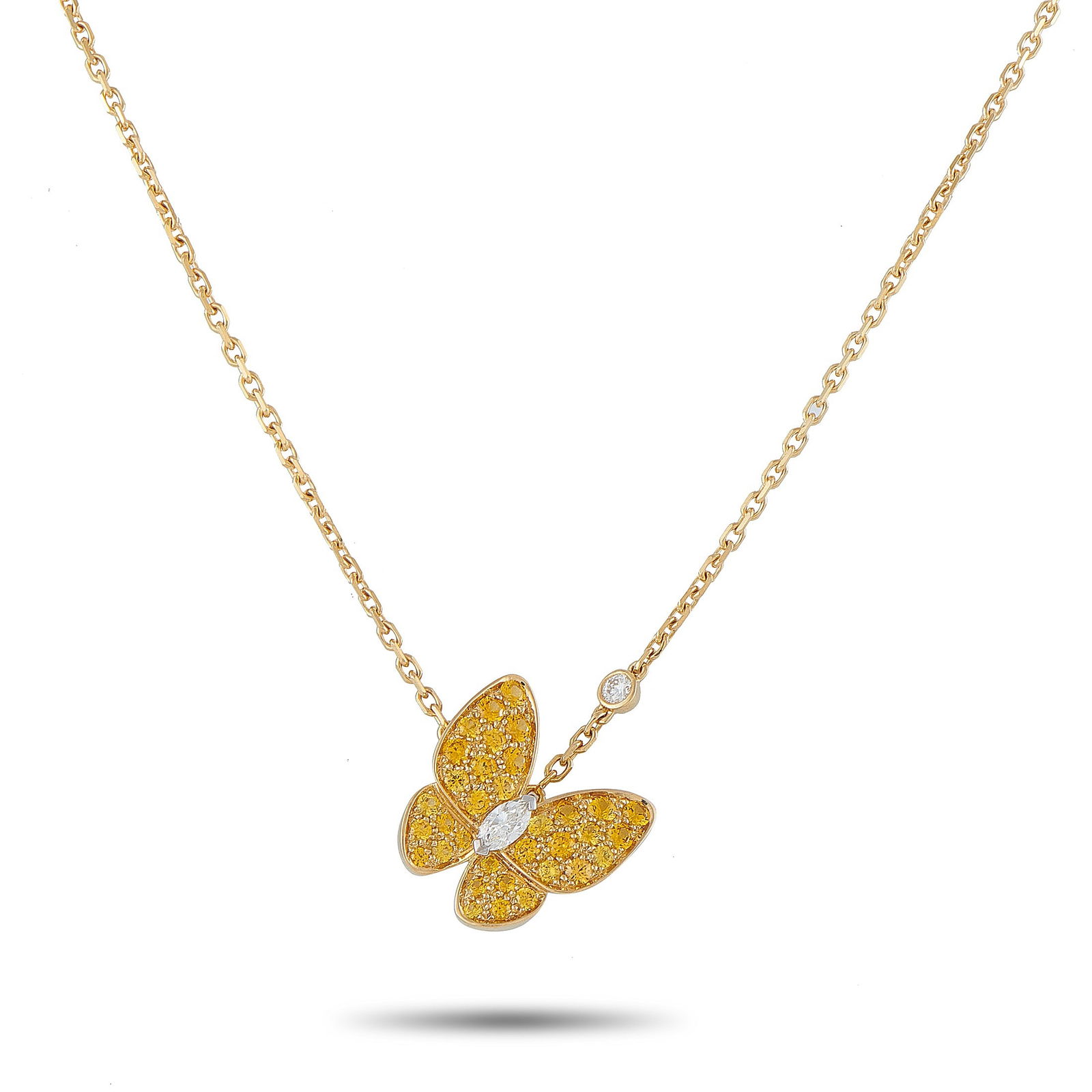 Van Cleef & Arpels 18K Yellow Gold Diamond and Sapphire Butterfly Pendant: This Van Cleef & Arpels necklace is incredibly charming. Crafted from 18K Yellow Gold, the stylish butterfly pendant comes to life thanks to sparkling yellow Sapphire gemstones. A bezel set Diamond on