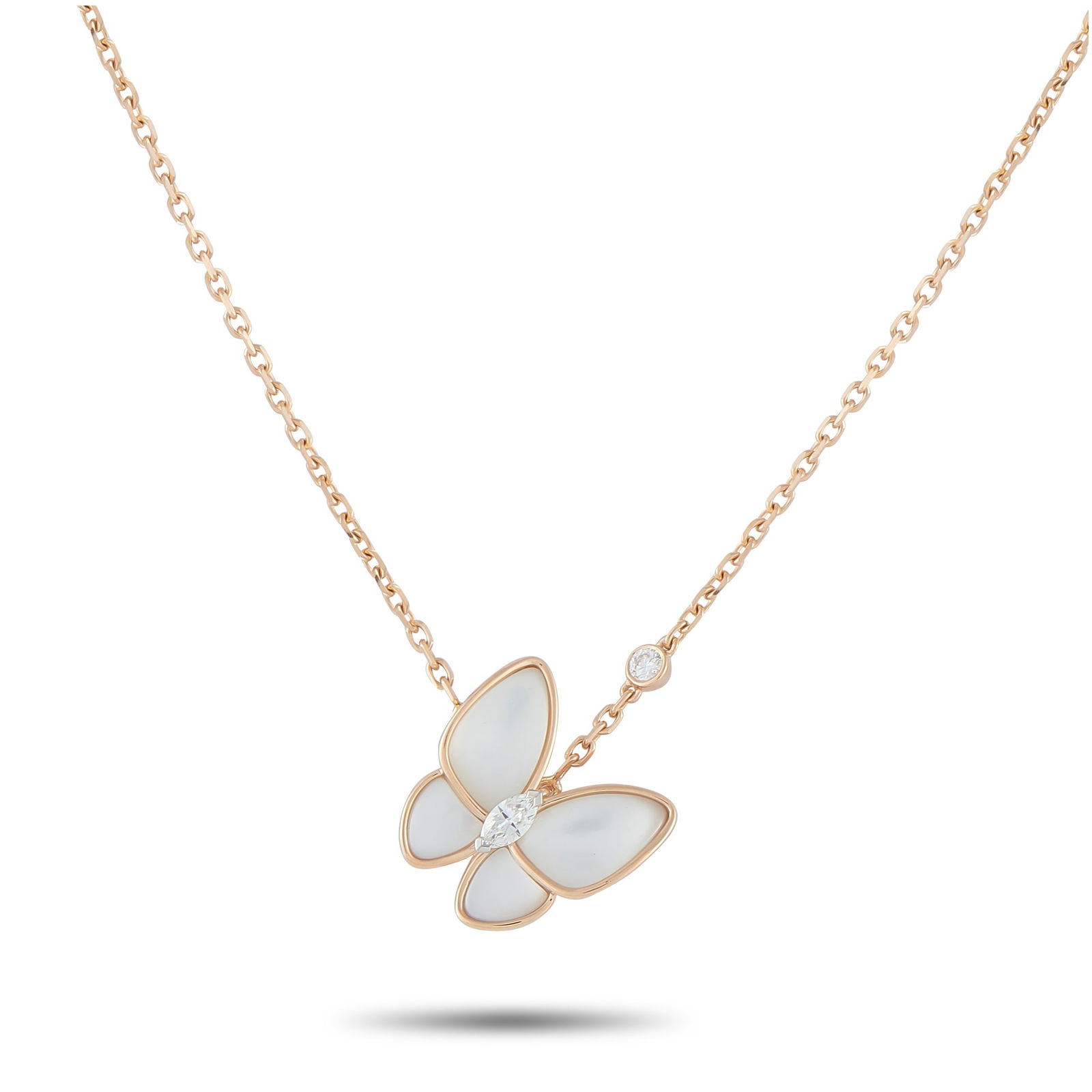 Van Cleef & Arpels Two Butterfly 18K Rose Gold Diamond and Mother of Pearl Pendant: This Van Cleef & Arpels necklace from the Two Butterfly collection is endlessly charming. Opulent Mother of Pearl wings beautifully complement the 18K Rose Gold metalwork. It features a marquise Diamo