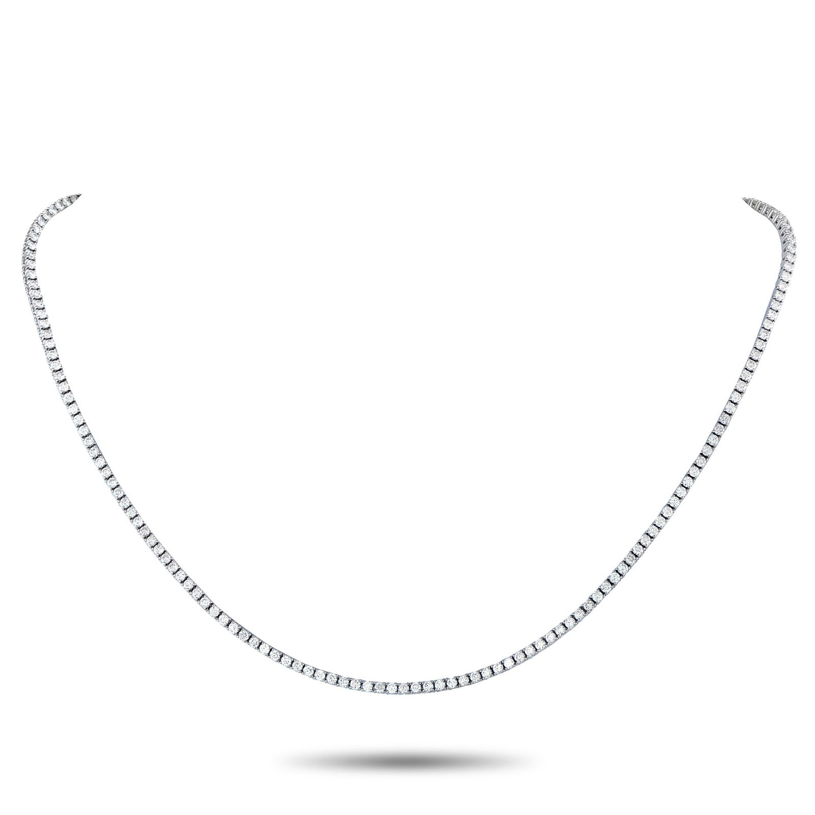Exclusive 18K White Gold 5.39ct Diamond Tennis Necklace: Undeniably elegant, this Exclusive tennis necklace features 5.39 carats of finely matched round diamonds. Each stone is set on an 18K white gold prong setting, forming the full 16.75-inch length of th
