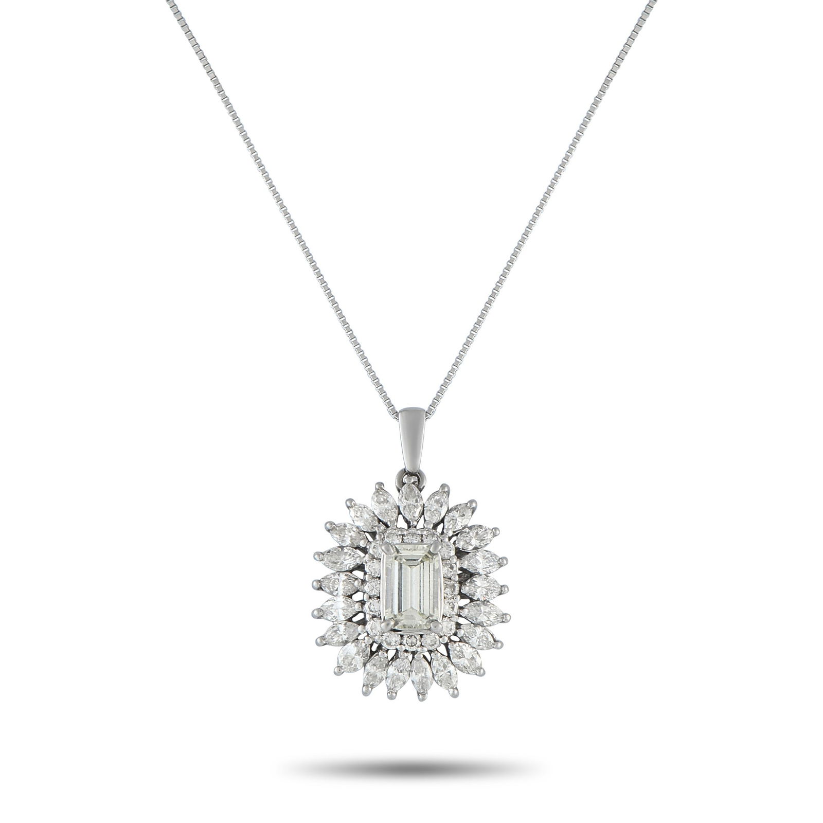 Exclusive Platinum 3.12ct Diamond Pendant: This luxurious necklace is designed to effortlessly catch the light. Set in Platinum, this piece’s pendant features a 1.05 carat Diamond center stone and a halo of additional Diamonds totaling 2.07